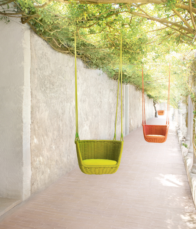 Adagio suspended seat by Francesco Rota for Paola Lenti , shown on the grounds of Jack Lenor Larsen's LongHouse Reserve in East Hampton, New York. Photo by Daniel Gonzalez.