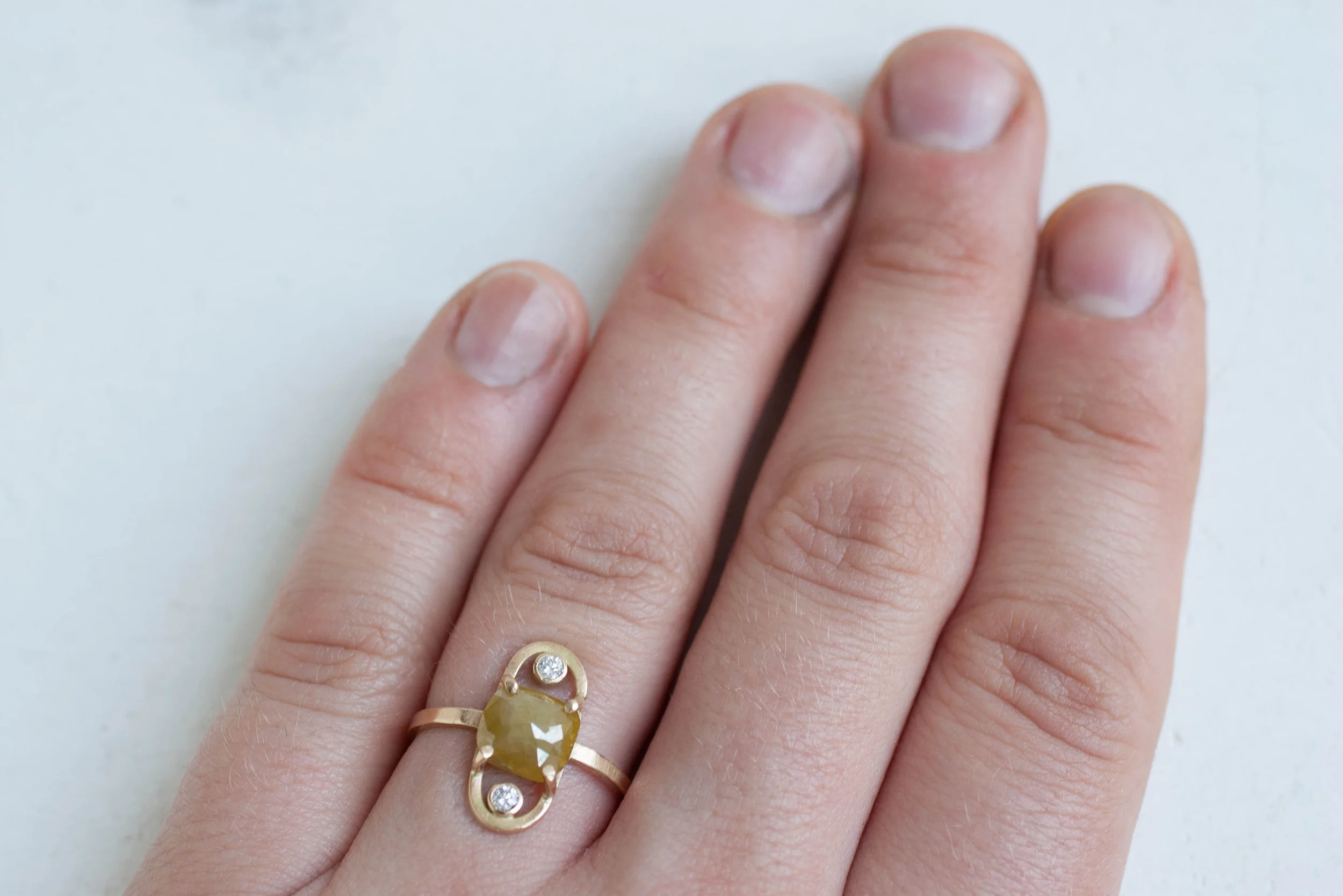 yellow cushion cut diamond ring loop-7.jpg