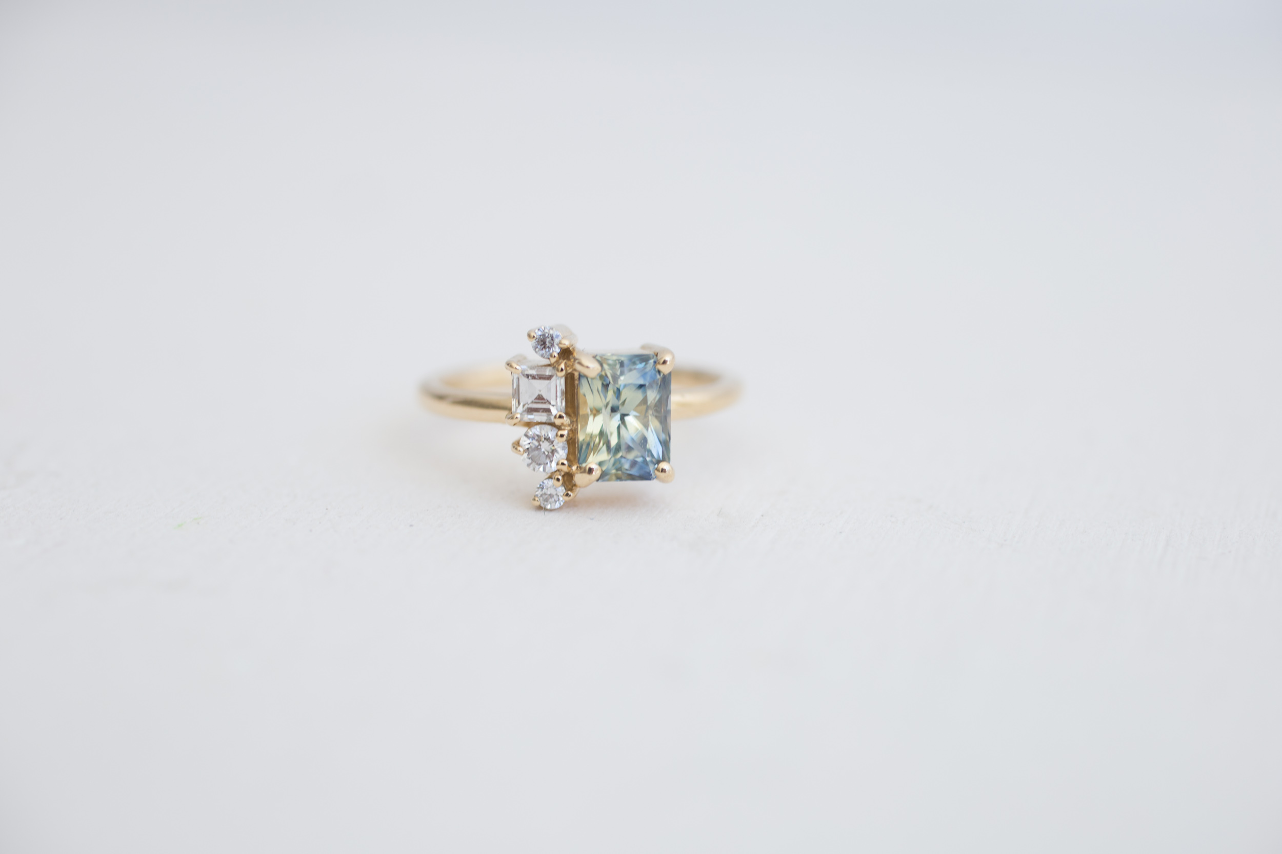 Bi Color Blue Yellow Radiant Cut Sapphire + Square Round Cluster Ring-16.jpg