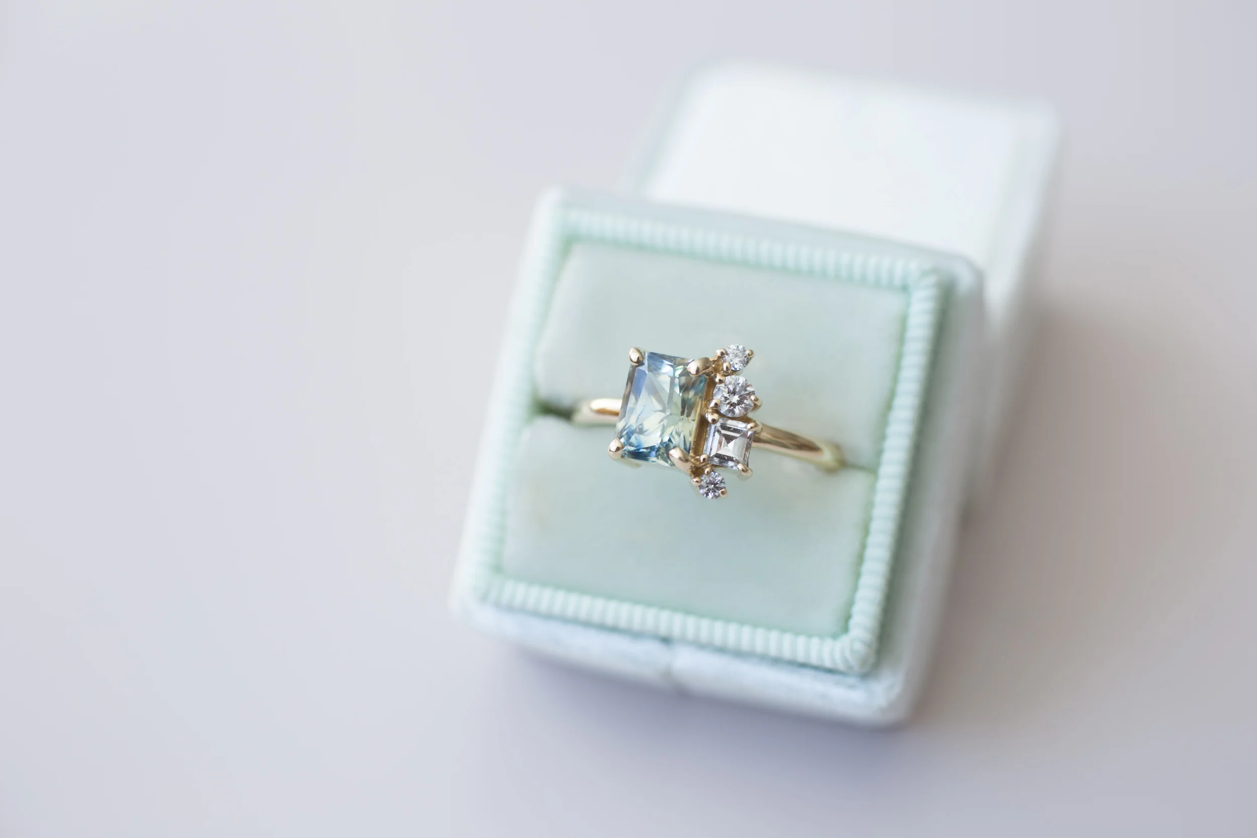 Bi Color Blue Yellow Radiant Cut Sapphire + Square Round Cluster Ring-6.jpg