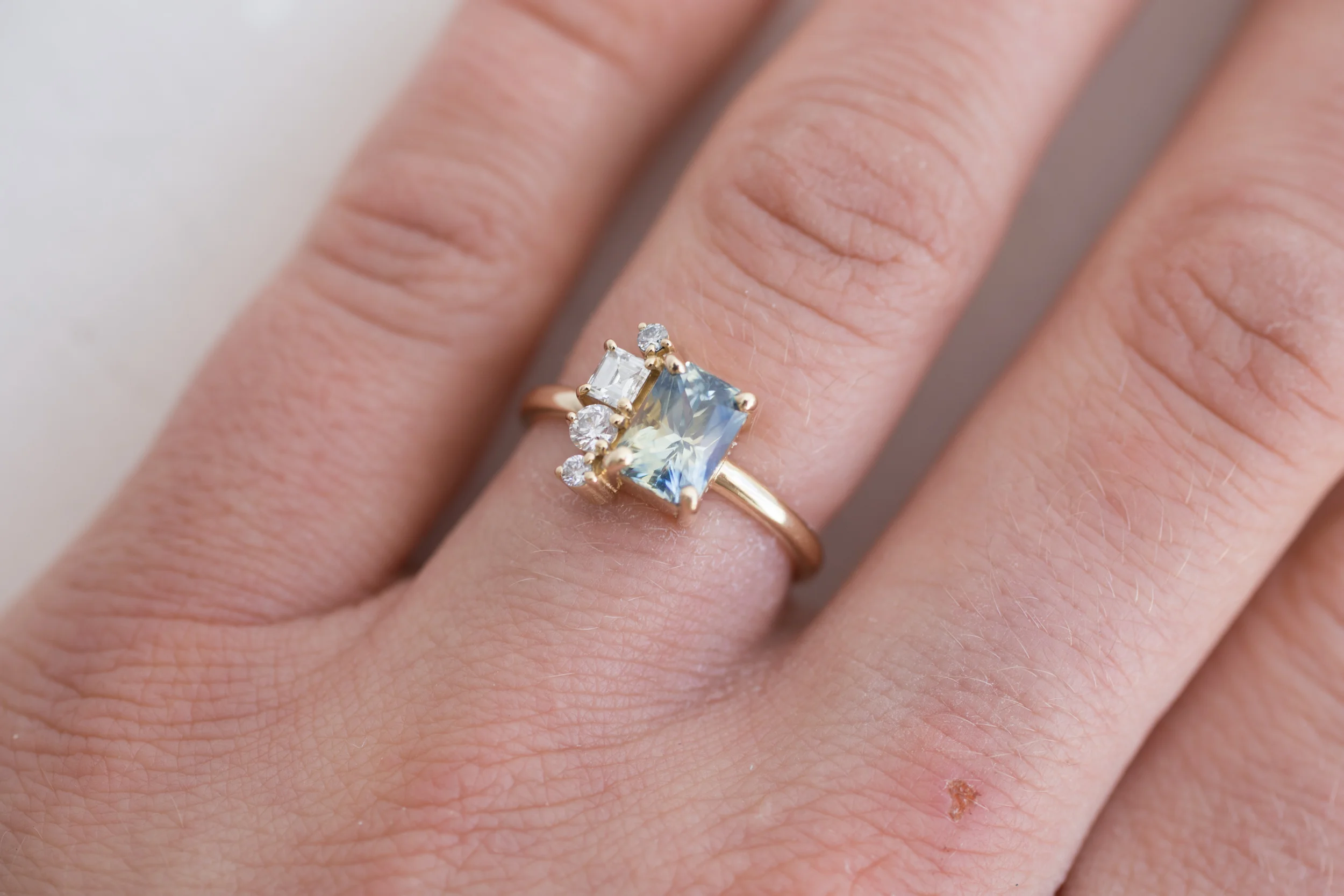 Bi Color Blue Yellow Radiant Cut Sapphire + Square Round Cluster Ring-15.jpg