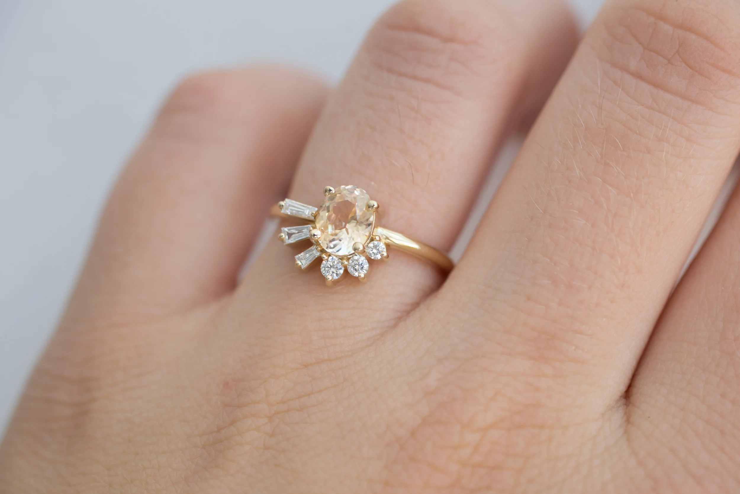 Apricot Sapphire Oval with Baguette Round Diamond Cluster-8.jpg