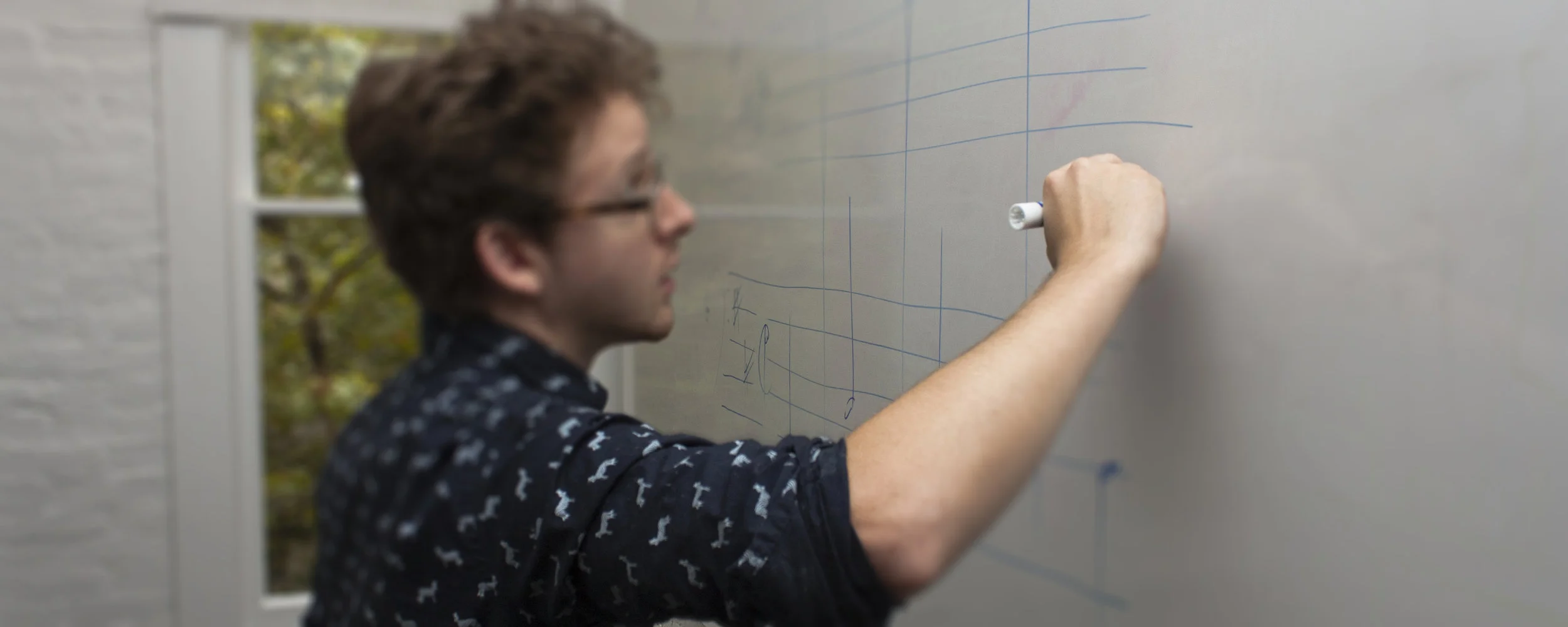 andrew_writing_tilt.jpg