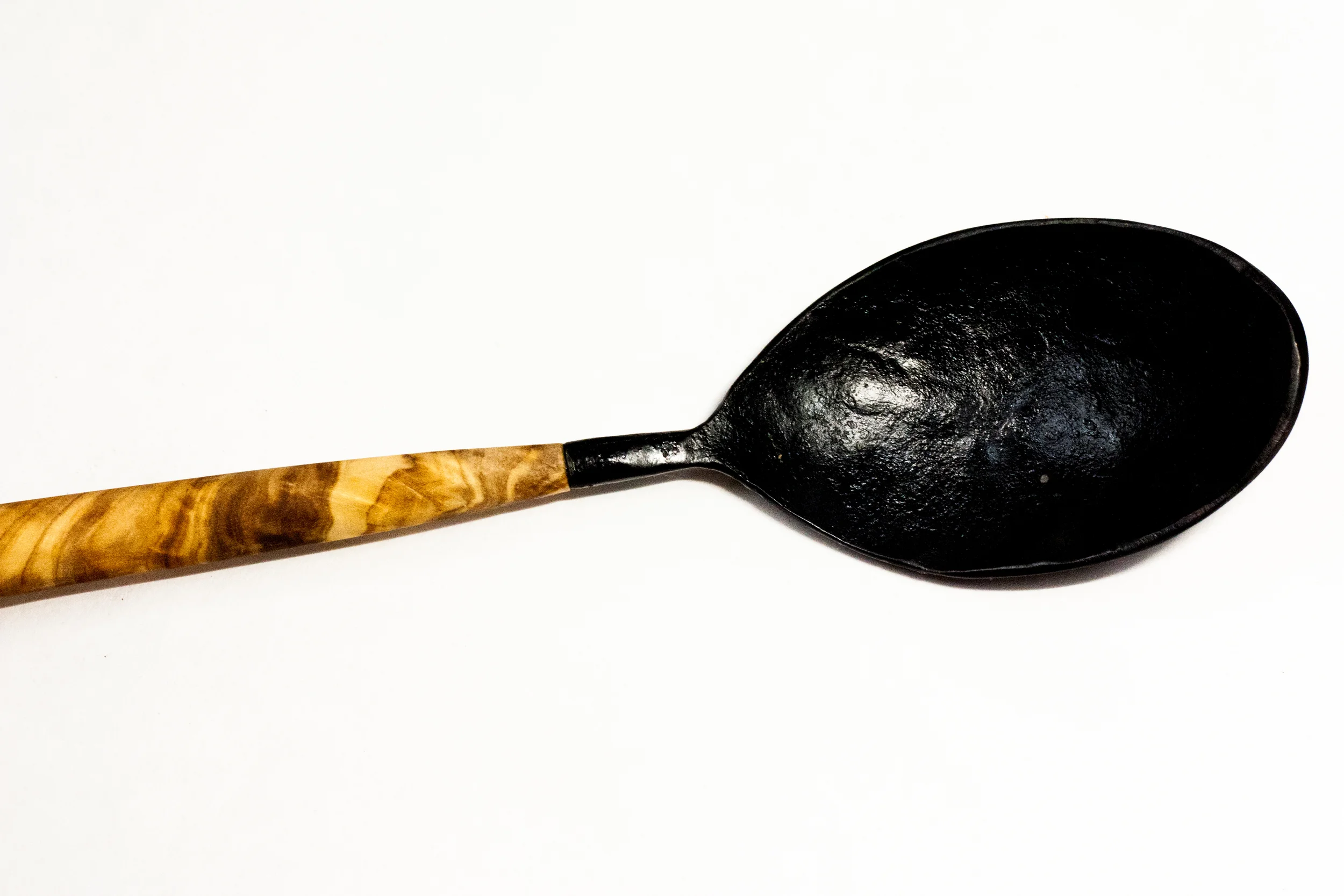  Forged mild steel is finished/cured with olive oil 