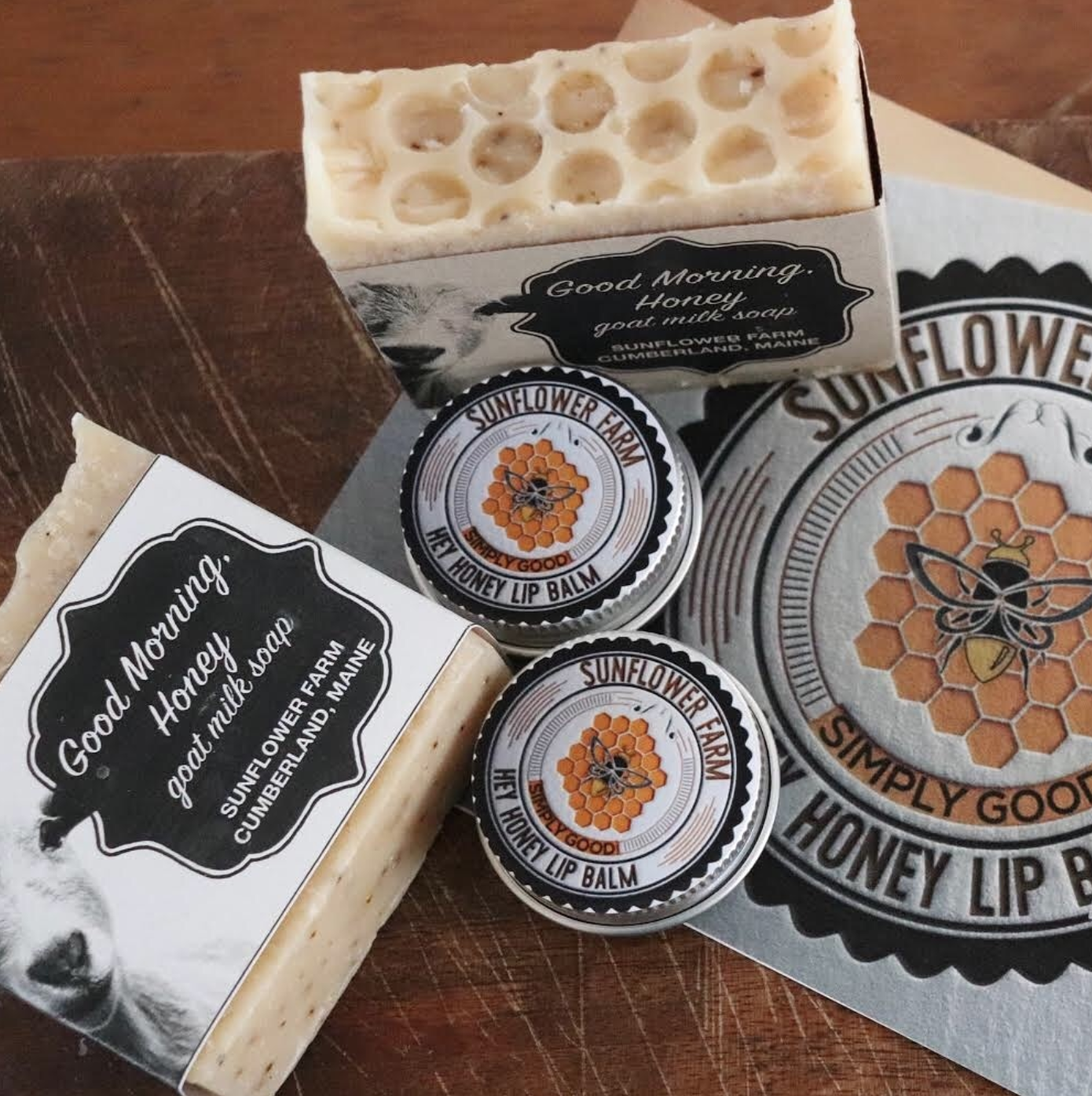 SUNFLOWER FARM GOOD MORNING HONEY SOAP- Since its ingredients are all tasty stuff you might eat for breakfast on a farm we think the name fits! GOAT MILK is the star of this amazing soap. The cream that is present in goat milk helps boost the moisturizing quality of goat milk soaps. We use late lactation milk which is super high in butterfat . Goat milk soap will not dry your skin out like many other soaps. Goat milk contains alpha-hydroxy acids which help remove dead skin cells from your skin. Goat milk is high in Vitamin A , which helps repair damaged skin tissue. Vitamin A can help to reduce lines and wrinkles, control acne, and provide some psoriasis relief. Goat milk also contains Selenium which has been shown to have an important role in preventing skin cancer. Selenium can also help prevent damage to the skin from excessive time in the sun. Many areas in the Northeast have pastures low in selenium. We supplement our herd with Selenium and copper for their health and soap rich in good minerals is the bonus! COCONUT OIL : The fatty acids found in coconut oil have antimicrobial properties that effectively kill bacteria and fungi. HONEY : Honey is naturally antibacterial, so it’s great for acne treatment and prevention. Honey is also full of antioxidants, which are great for slowing down aging. It is extremely moisturizing and soothing, so it helps create a glow. OLIVE OIL : Olive oil contains antioxidants that fight free-radical damage and an ingredient called squalene, which is extremely hydrating. COFFEE GROUNDS : The exfoliating properties of coffee will certainly make your skin soft and smooth OATMEAL : Oatmeal contains zinc that is said to reduce inflammation and kill the acne-causing bacterial action. It also helps to soak up the excess oil from the skin that may trigger acne.