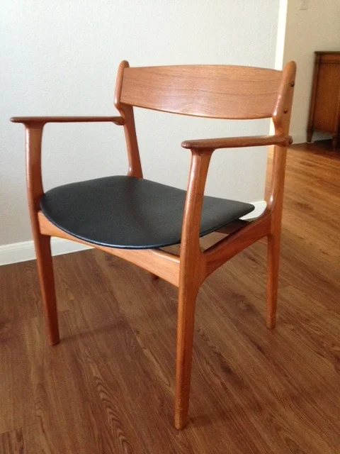 Rosewood mid-century modern arm chair by Erik Buch