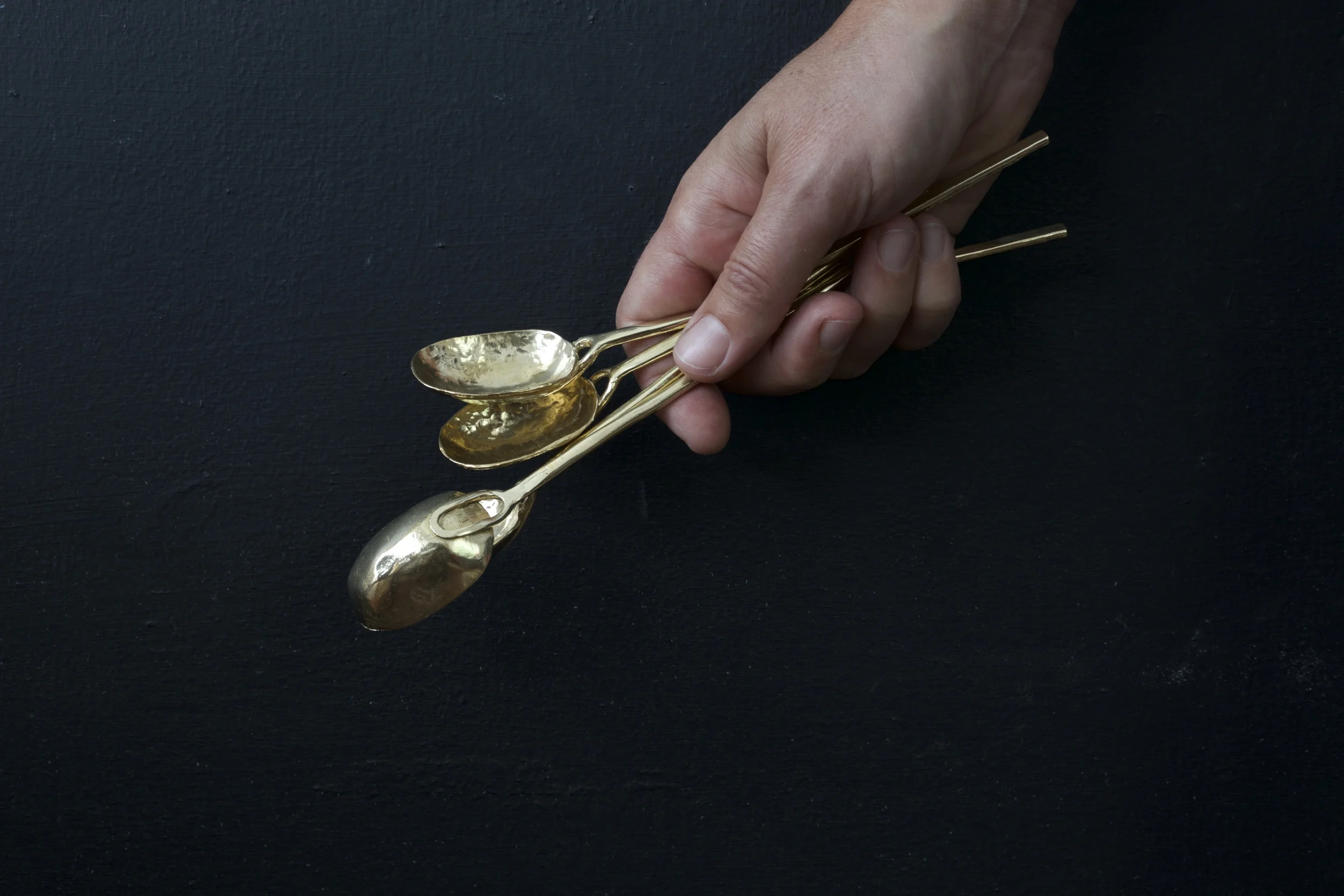 forged teaspoon, bronze