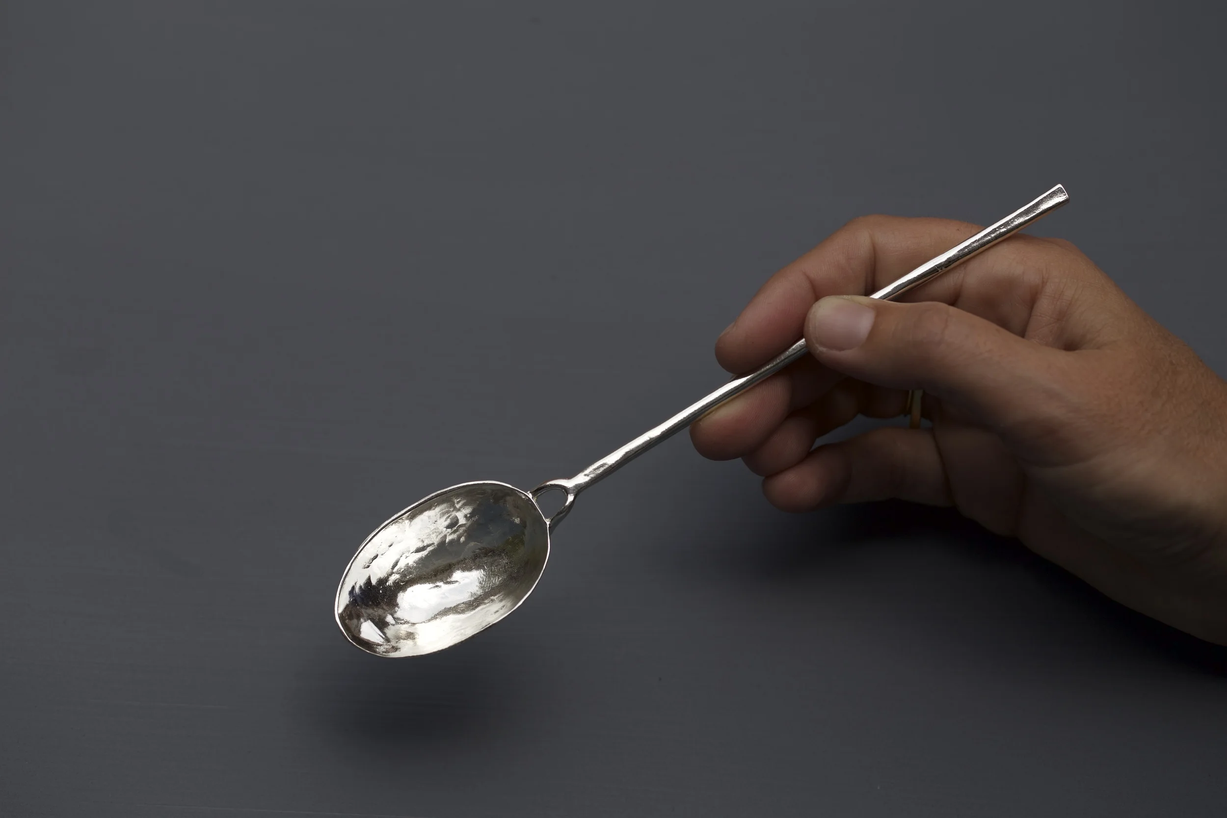 forged soup spoon, sterling silver