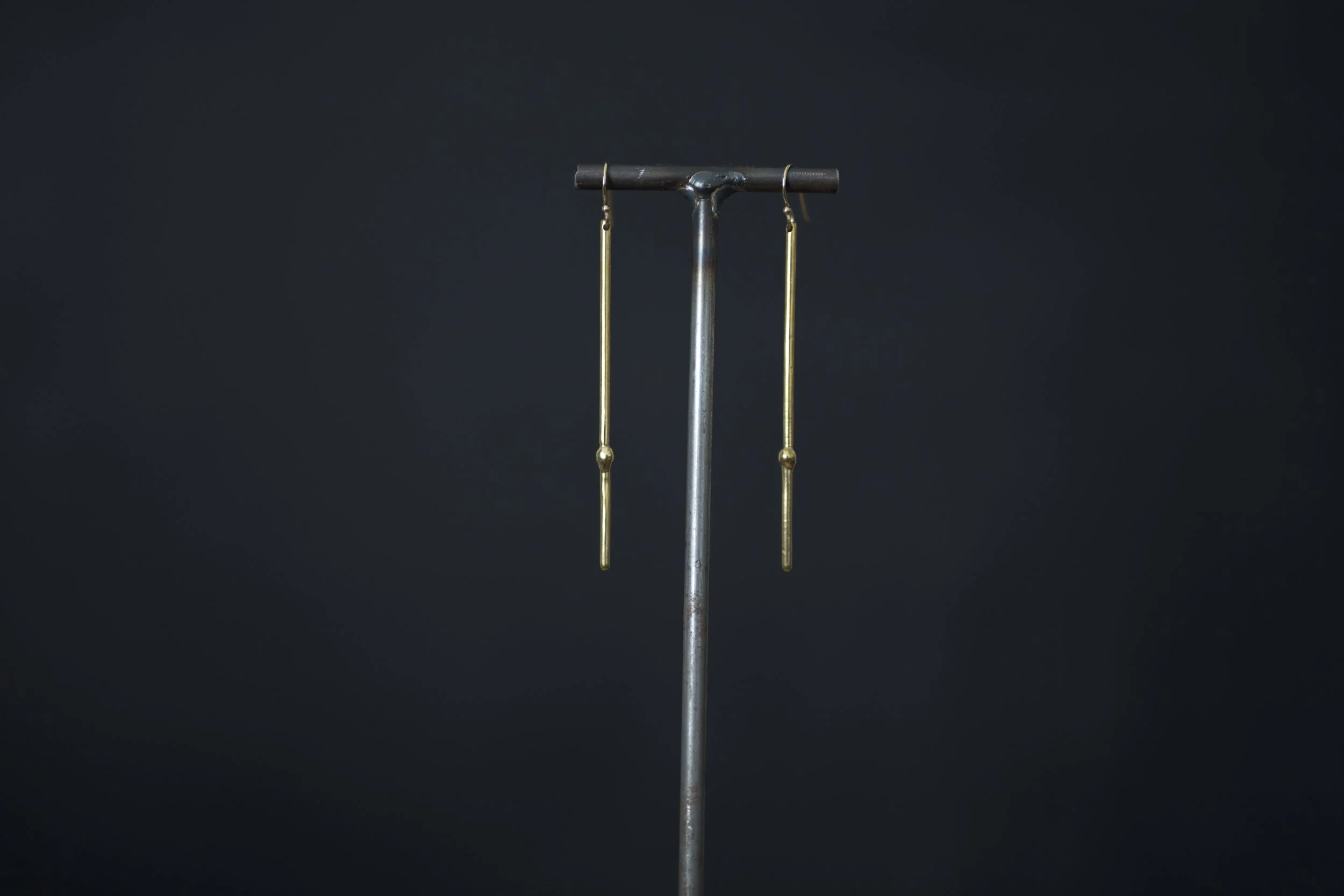 bronze bulbous stick earrings