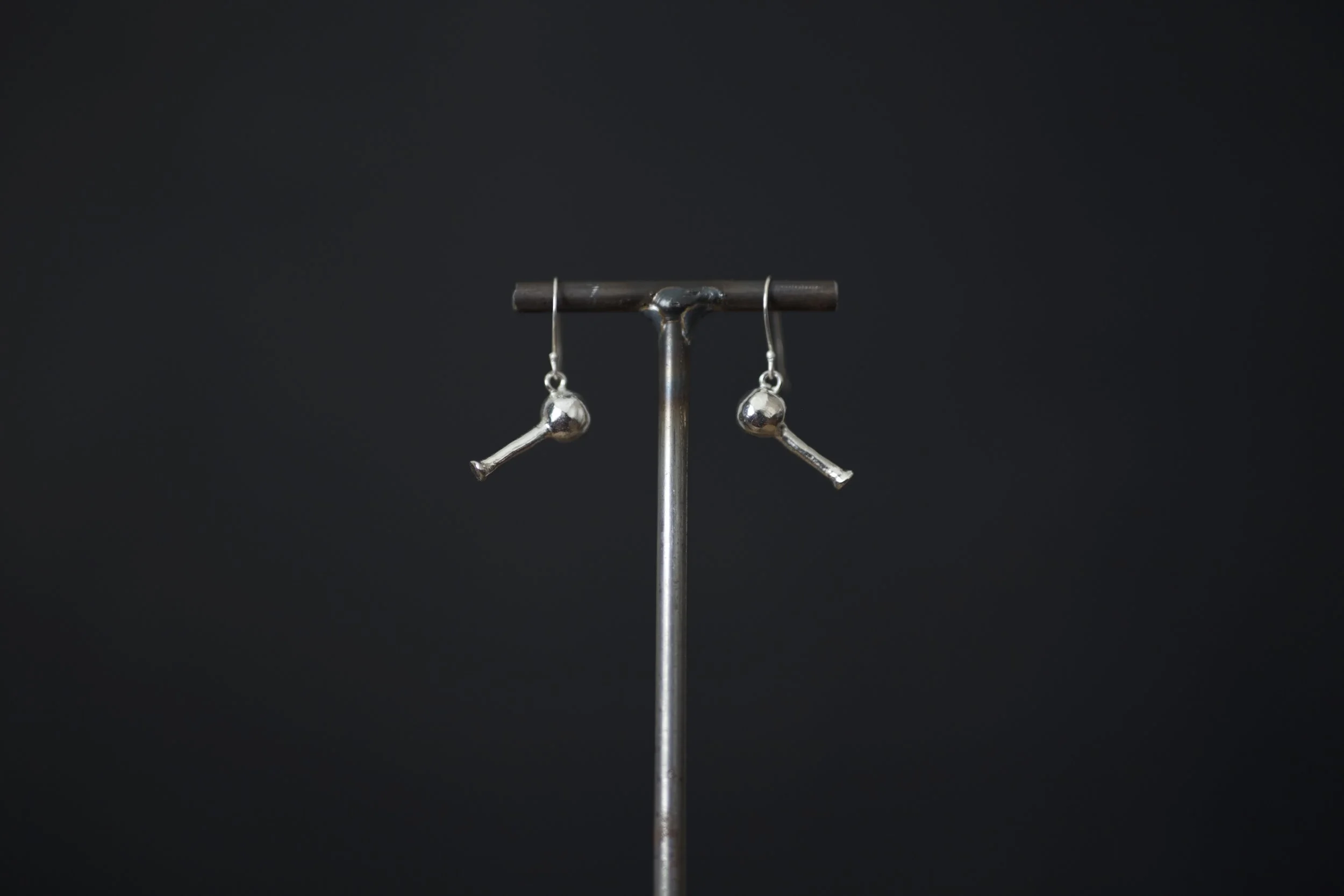 silver long neck jug earrings