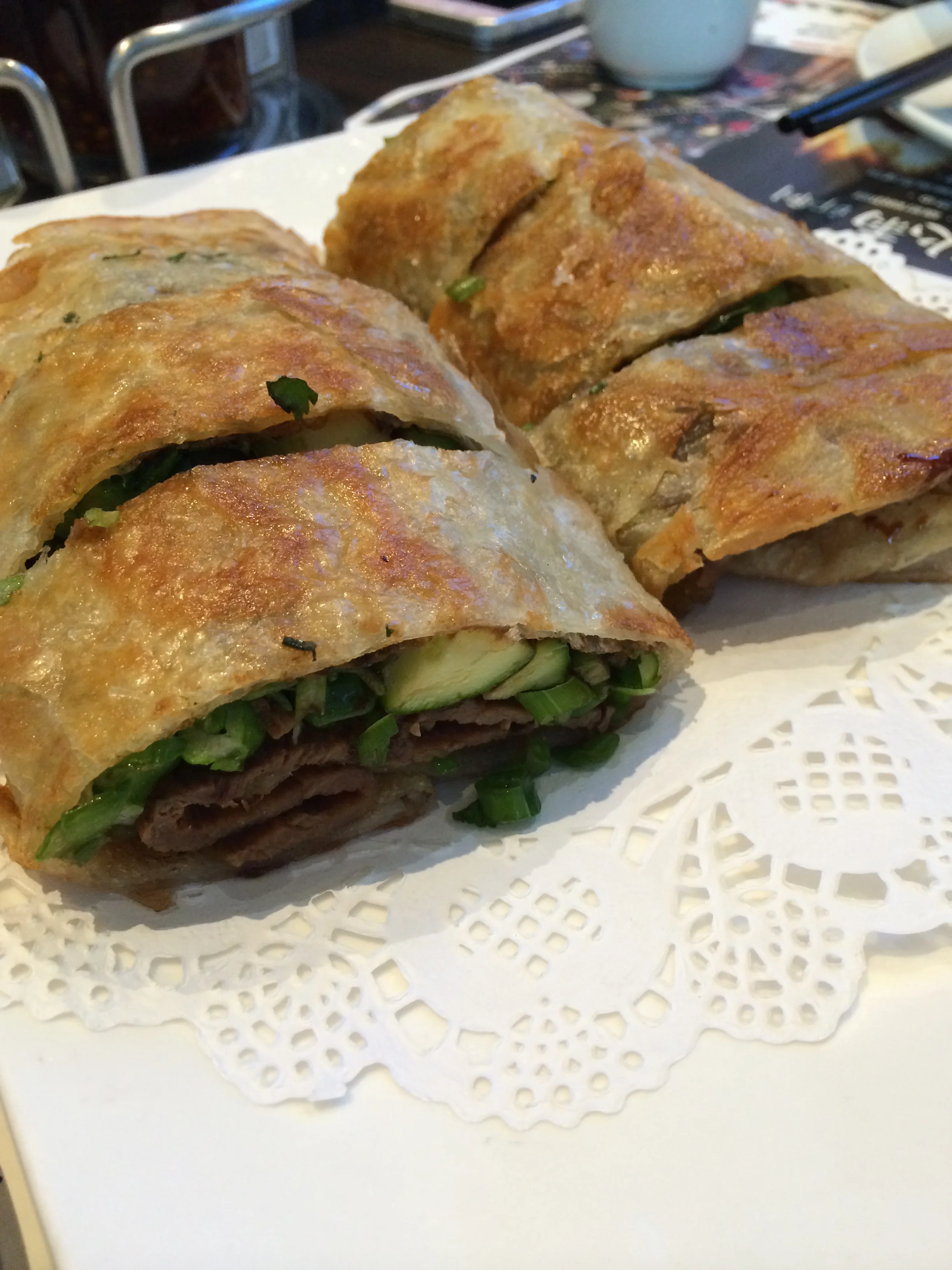 Beef roll - green onion pancake with beef, cilantro, cucumber and asparagus