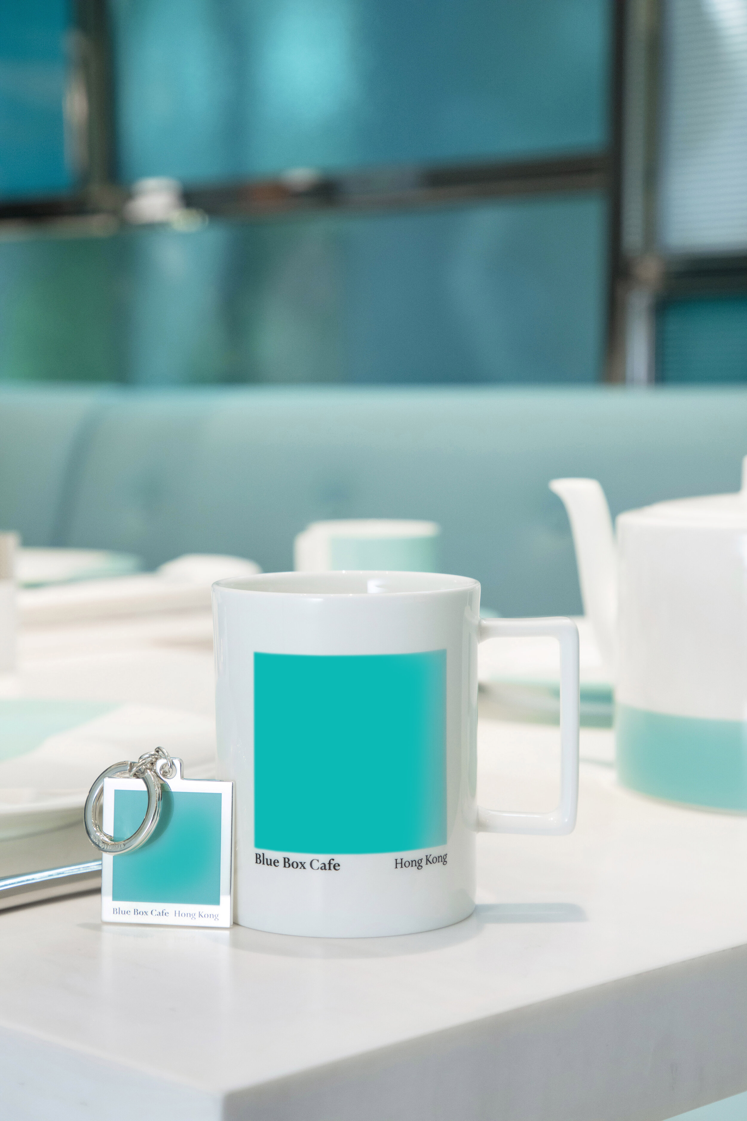  To mark this special occasion, a bone china mug and a sterling silver Blue Box keyring will be exclusively available at the new Tiffany One Peking Road Flagship store.   The Tiffany Blue Box Cafe bone china mug HK Retail Price – HKD 440   The Tiffan