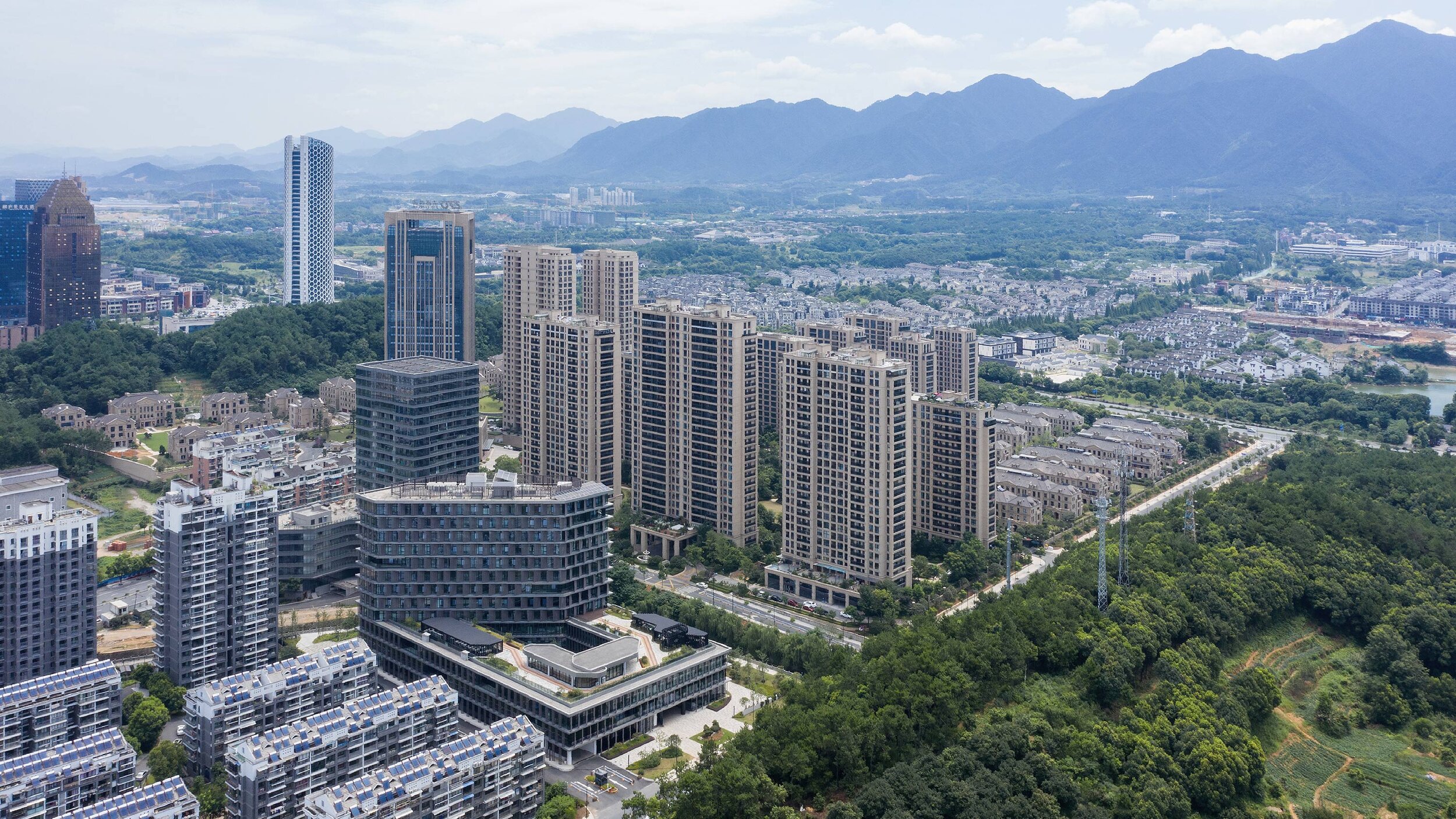 Hangzhou-Tonglu-Archives-Building-BAU-05-Adding-a-tower-to-satisfy-inner-urban-densities.jpg