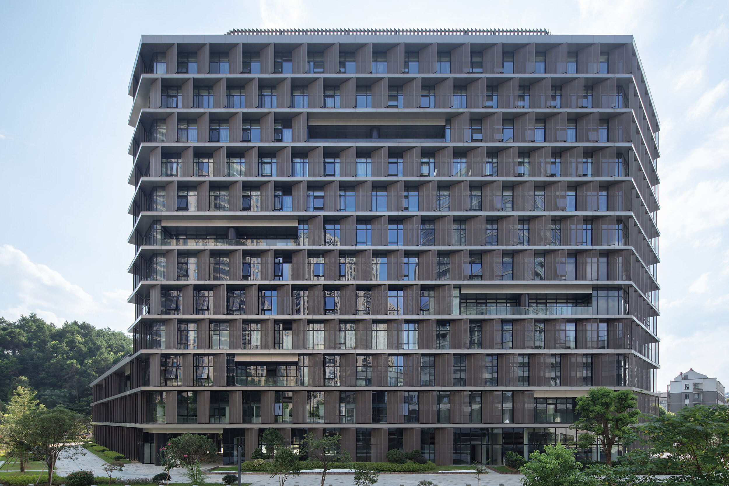 Hangzhou-Tonglu-Archives-Building-BAU-10-Metal-petals-covering-unified-facades.jpg