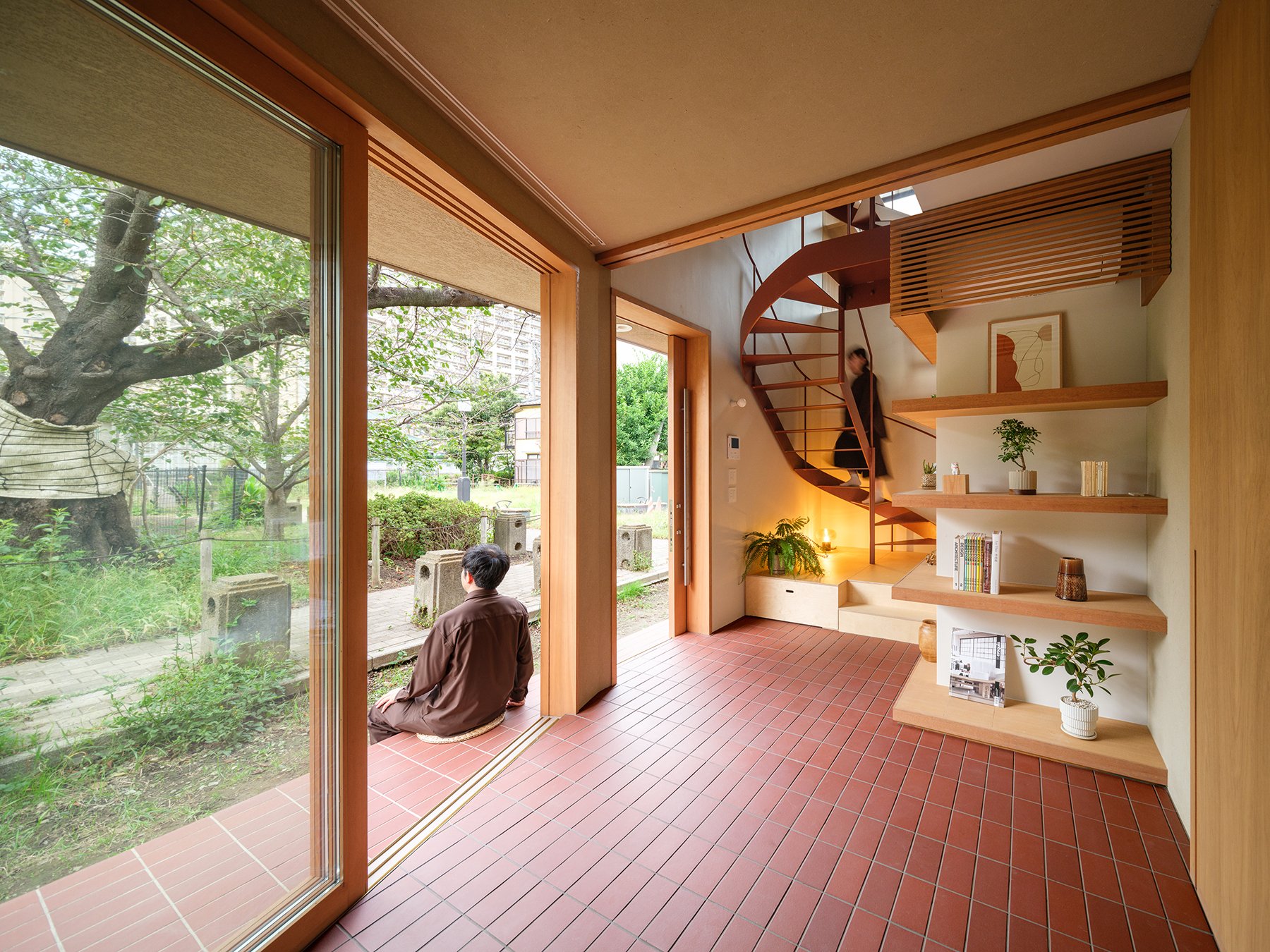 A House with a Cylindrical Water Divider designed by SHO KATATAOKA ARCHITECTS