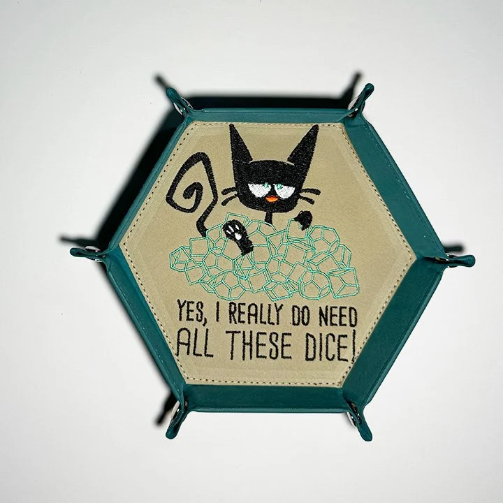 NEED ALL THE DICE CAT.jpeg