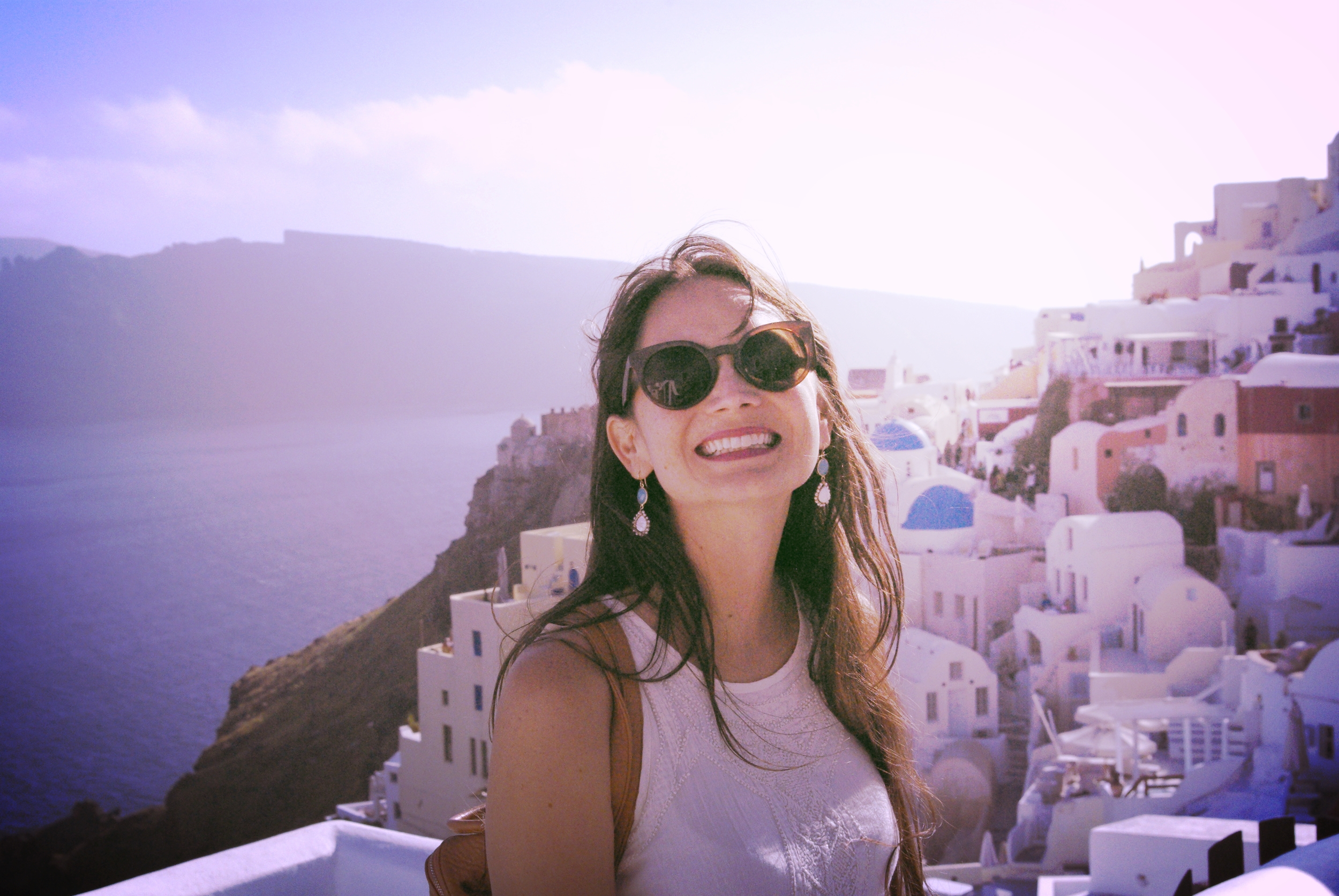 Image from my own collection. Taken in Santorini, Greece. In the little town of Oia. Earrings by BECK Dutch Caribbean . Dress by Mango (Curacao Renaissance Mall).