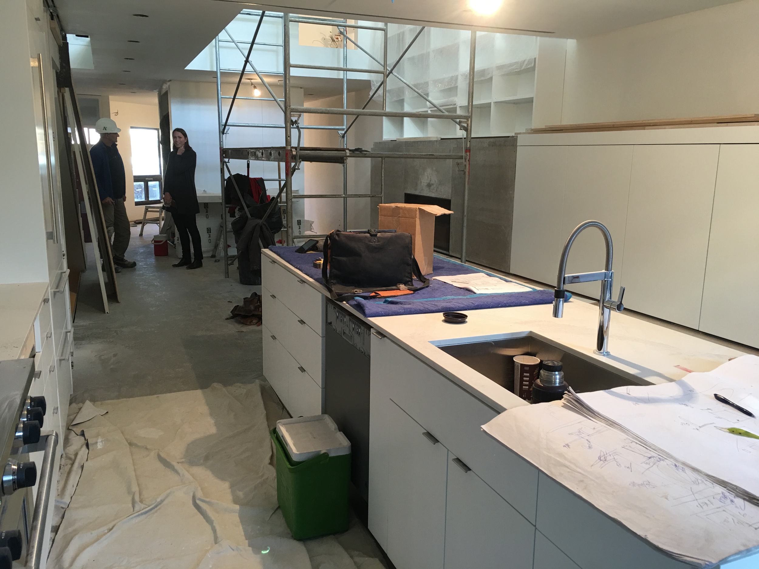Millwork installation and painting - kitchen and atrium