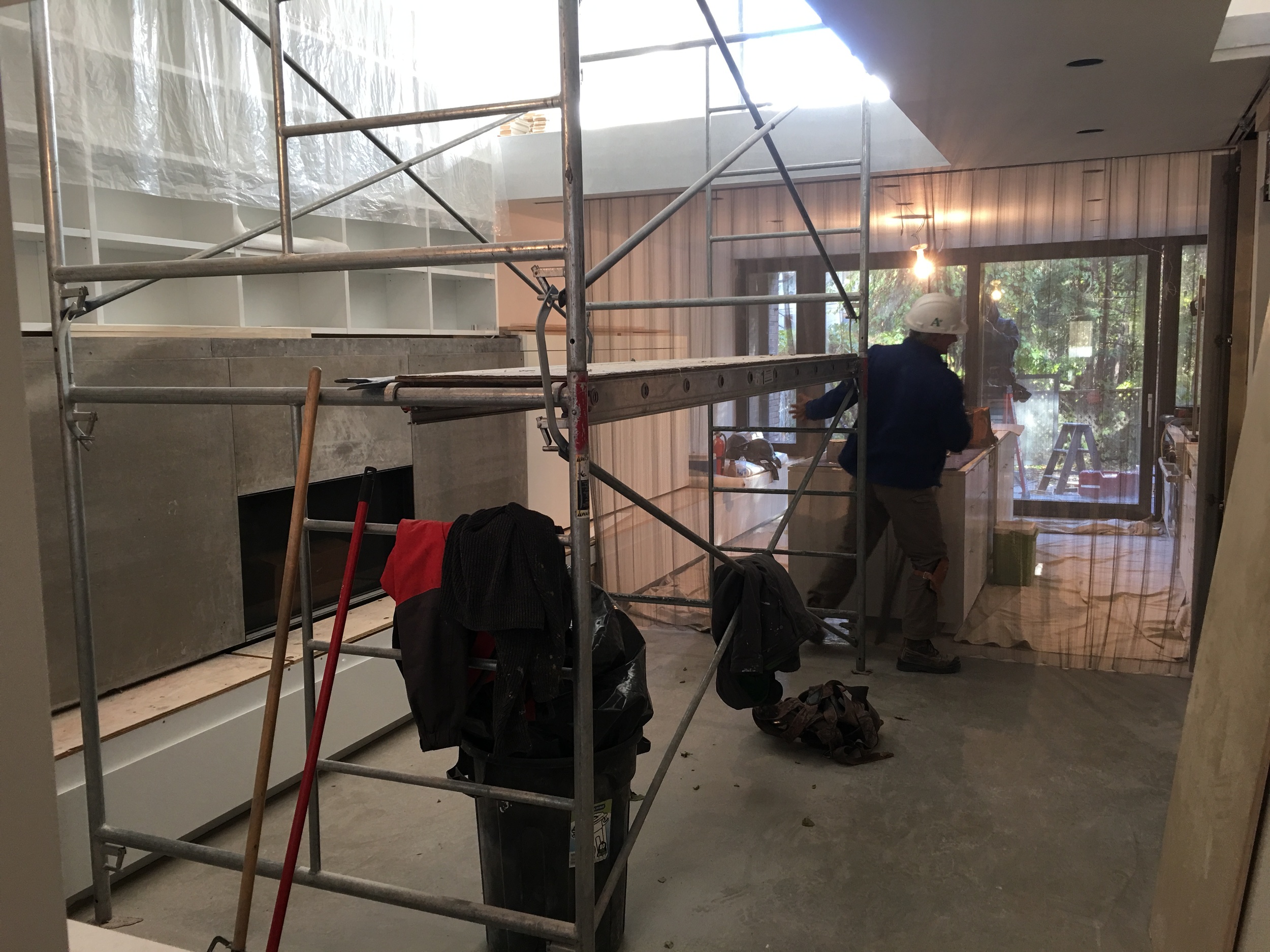 Stainless steel 'curtain' - between atrium and kitchen