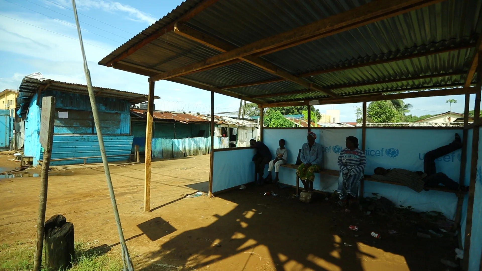  Monrovia, Liberia - Sept 15, 2014: &nbsp;People wait outside the Ebola treatment unit at JFK Hospital for hours in hopes of being admitted.&nbsp;Photo by Morgana Wingard 