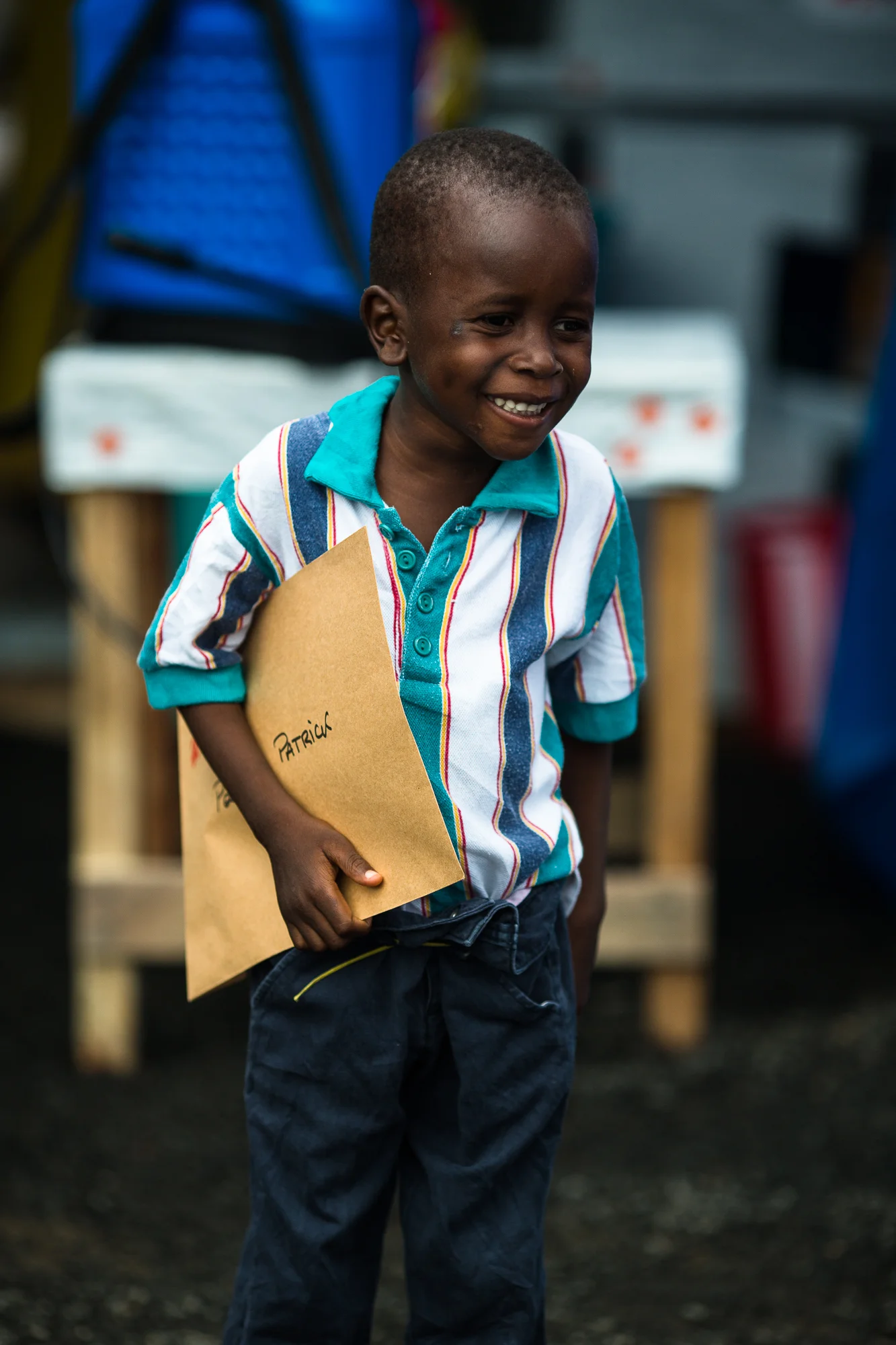  Monrovia, Liberia - Aug 31, 2014: &nbsp;Patrick Poopei (6)&nbsp;holds his certificate that he is Ebola free. Patrick and his father were both released from ELWA 3 —  the Ebola treatment unit&nbsp;run by Doctors Without Borders (MSF).&nbsp;Photo by M
