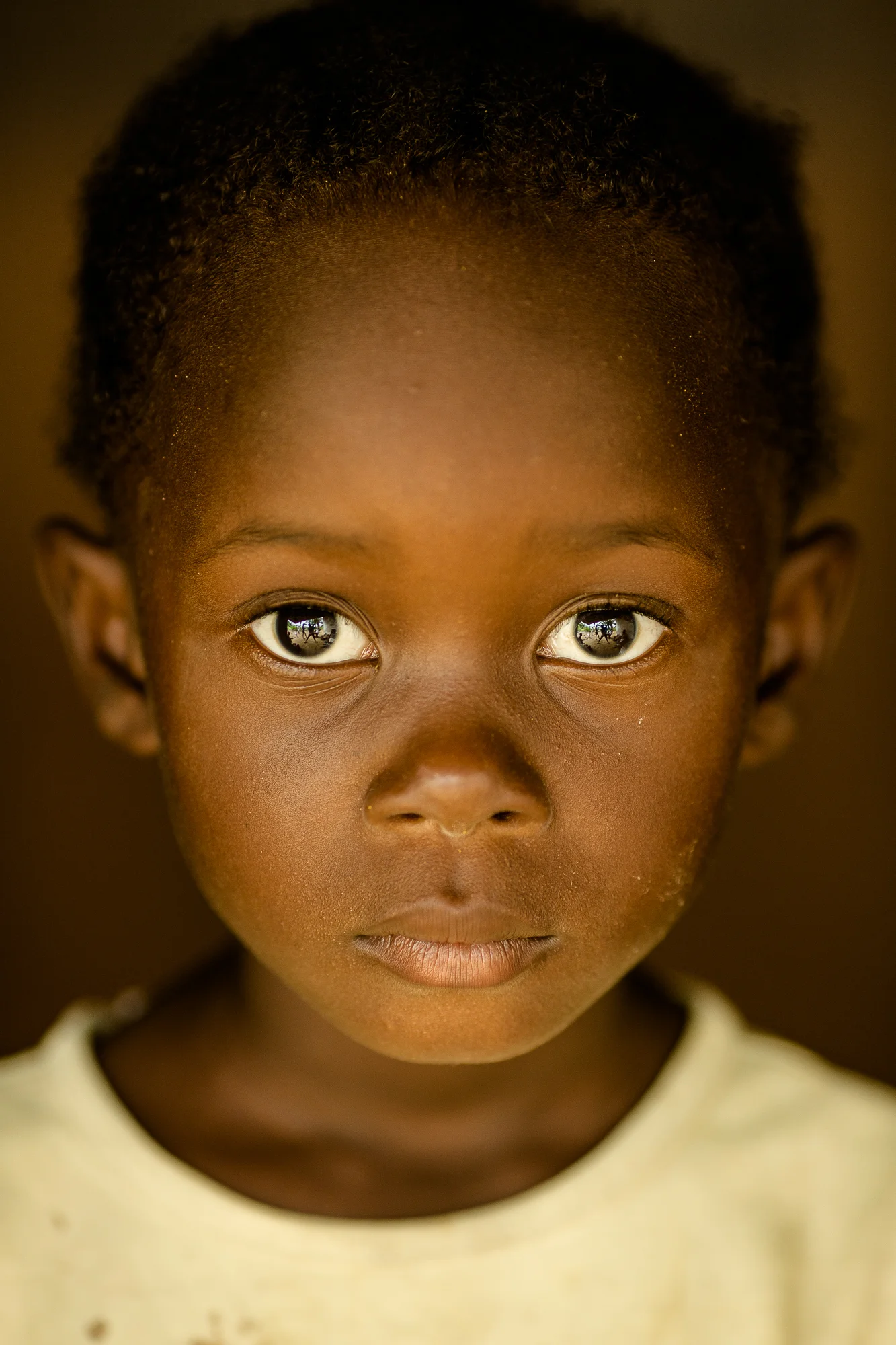 Tubmanburg, Monrovia, Liberia - June 5, 2014: When Blessing was 4 months old, her mother, Bendu, was working on a farm in rural Liberia. One day she forgot something at home and left Blessing with a close friend at the farm. When she returned, Bless