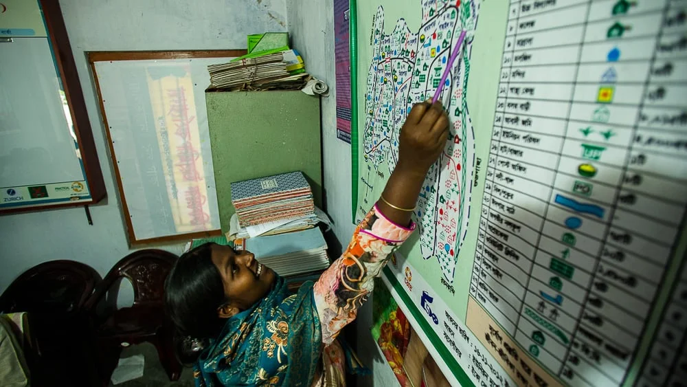 Disasters including cyclones, floods, mud slides, tornados, river erosion and drought frequently affect Bangladesh. Since independence in 1971, more than 40 catastrophic flood disasters have hit Bangladesh, an average of one such disaster per year. Monjuara is now a member of the standing committee on sanitation, water supply, and sewage for her local government. She represents her community and ensures their needs are met in addition to advising them when there is a flood.