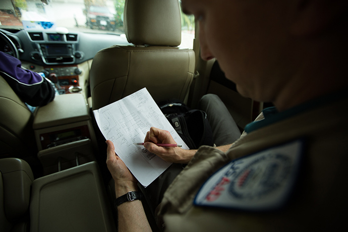  Andrew sketching drawings for an Ebola treatment unit. 