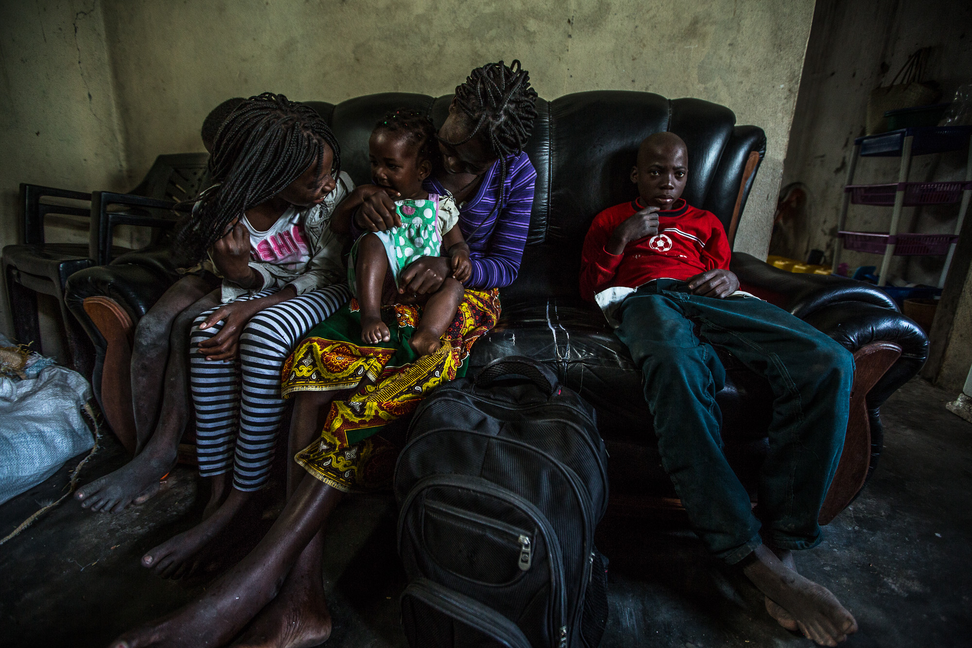 Salima spends most of her days watching TV at home with her kids.