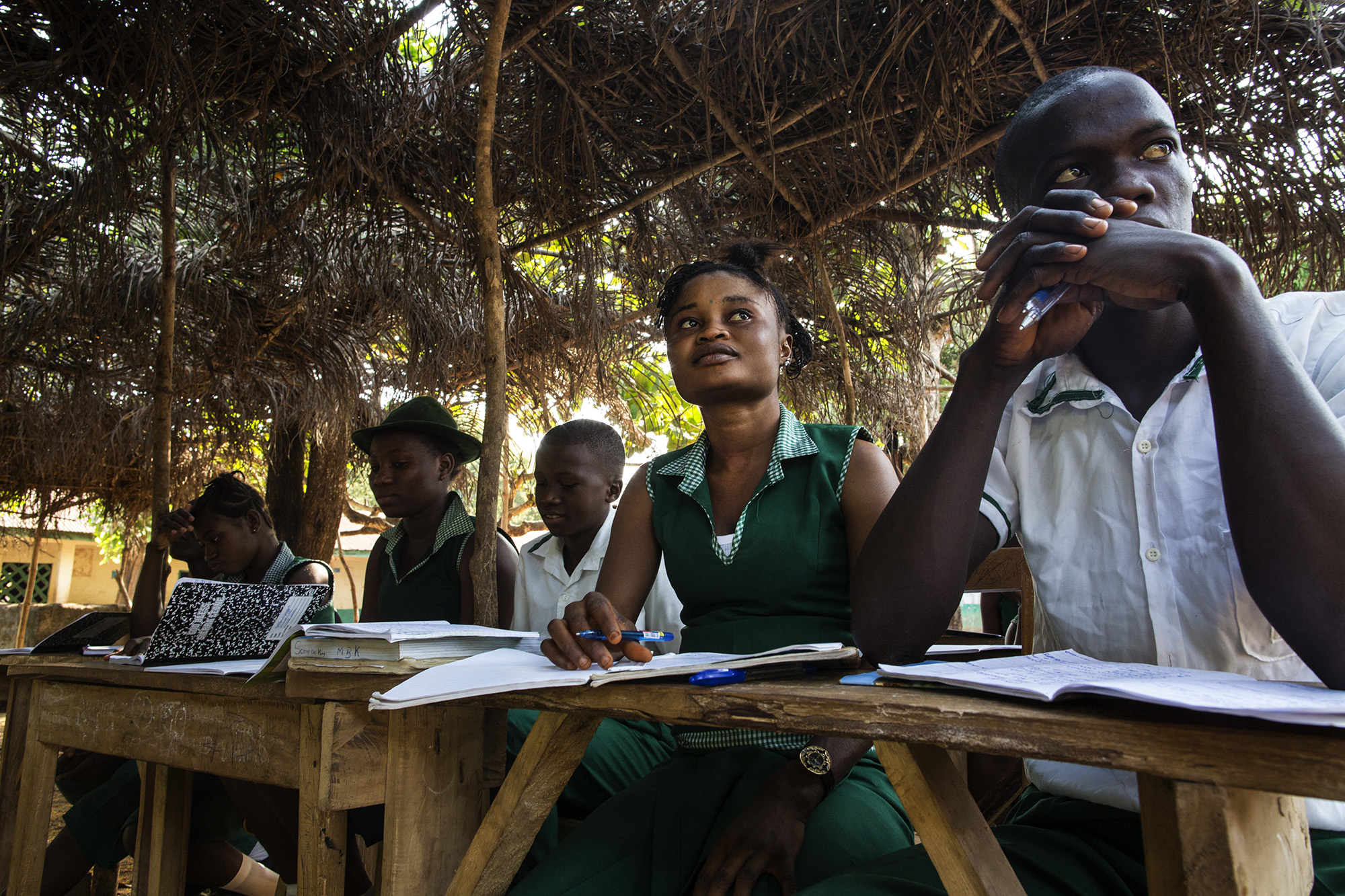  Mariatu Bangura, 18, of Rokupr, second from right, attends Kubra Agricultural Secondary School. 