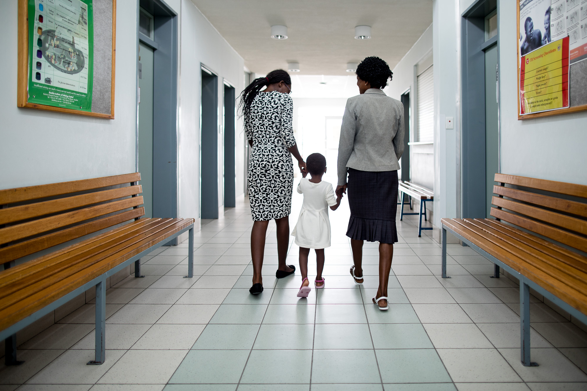 HIV patient Loide Iikuyu, 45, and two of her daughters