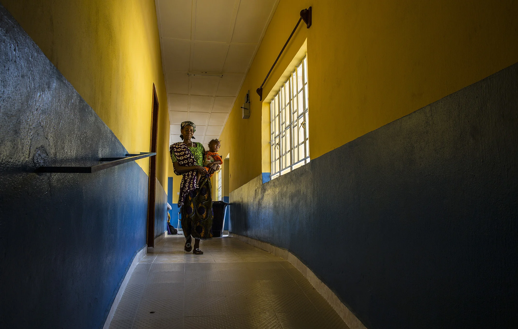  A visitor walks through Konsho CHP.&nbsp; 