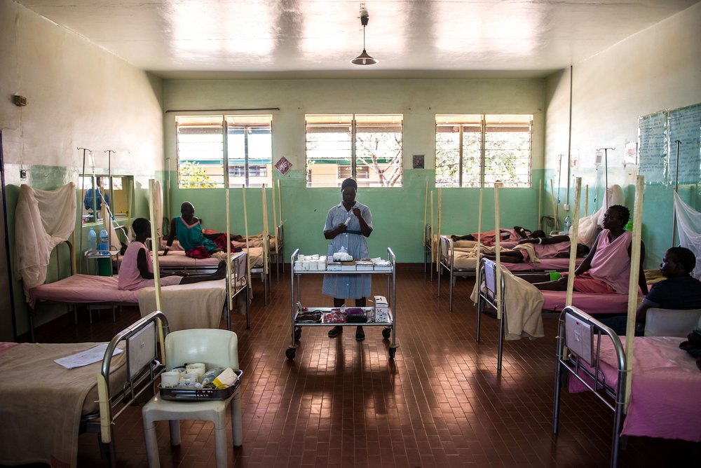  A staff member prepares pateitns’ medications in the maternity ward of the Matany hospital in Karamoja, Uganda. 