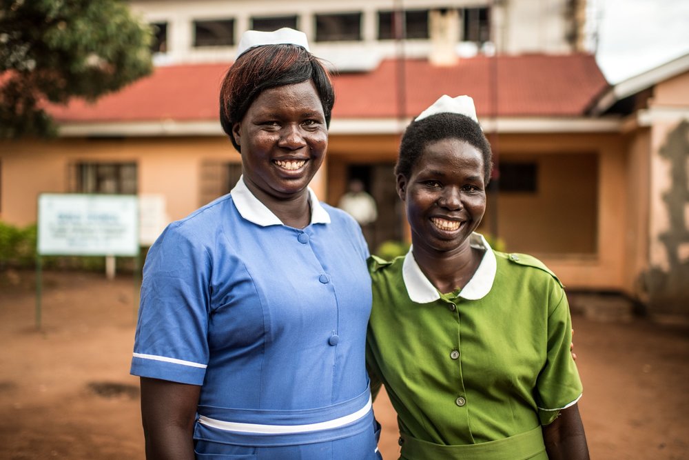  Beatrice Aciro, midwife and graduate of the Good Samaritan School of Nursing & Midwifery, photographed with her sister. Lira, Uganda. 