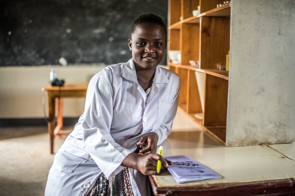  Atim Olive, 24, a student at the Soroti Pharmacy School, photographed in the lab. 