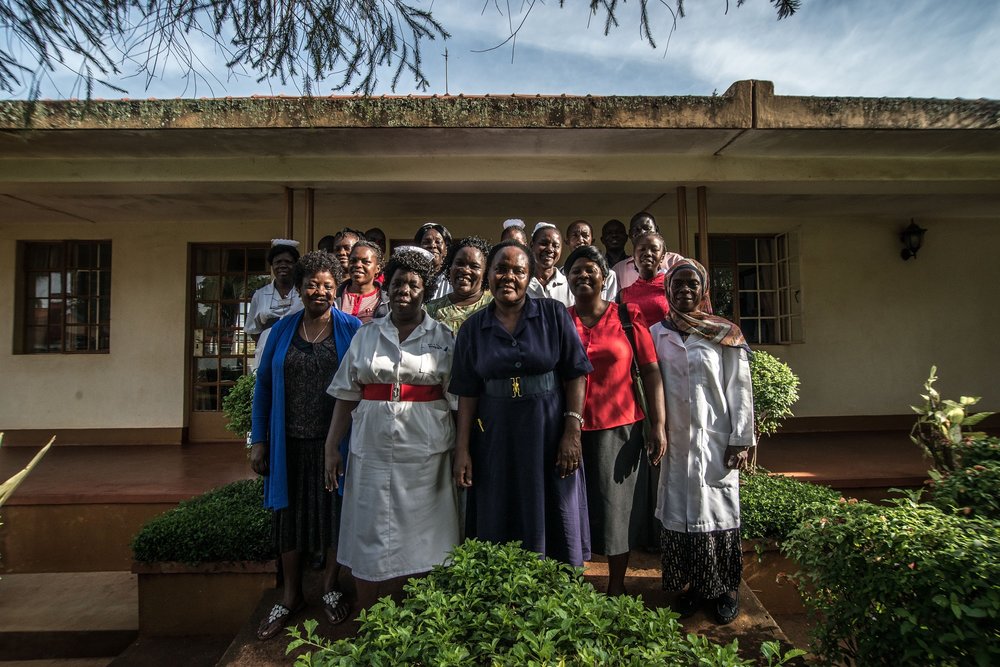  Staff of the Jinja General Referral Hospital poses for a portrait. Jinja, Uganda. 