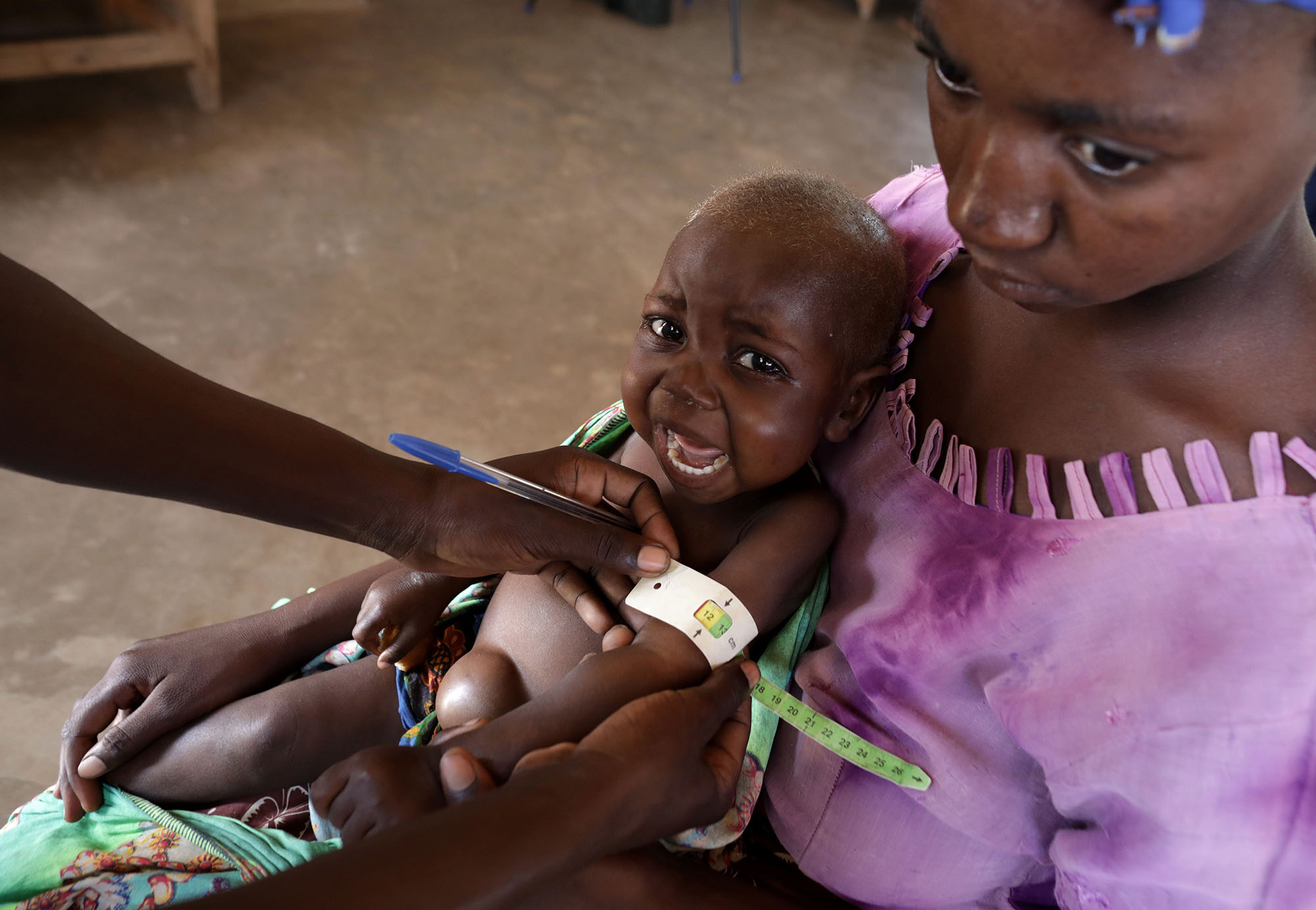  &nbsp;Maness Hastings is taken to the Phimbi Health Centre for a check-up. Photo by Josh Estey.&nbsp; 