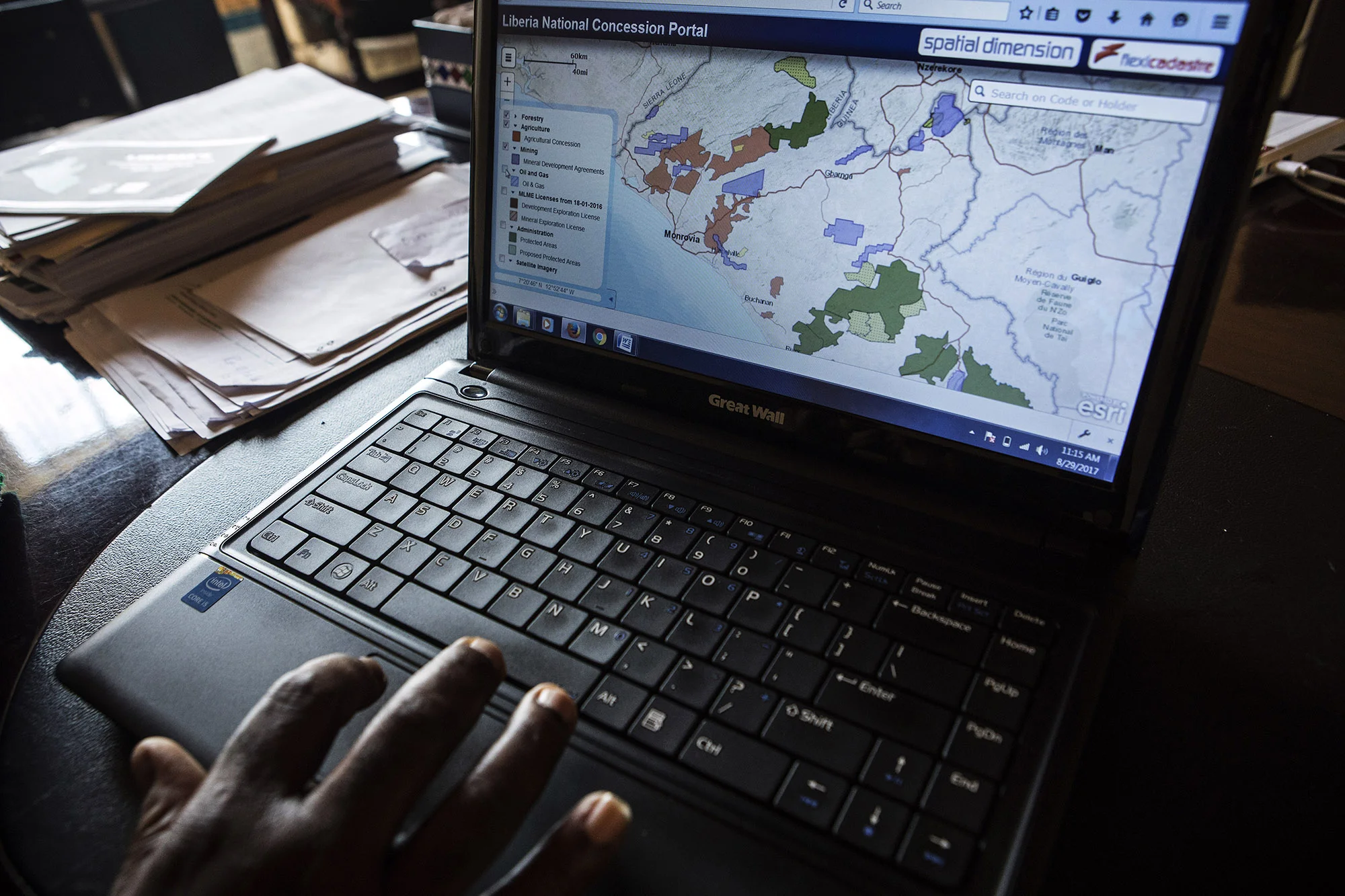 MONROVIA, LIBERIA: Aug. 29, 2017 - Andrew G. Temeh, Deputy Minister of Administration at the Ministry of Information (MICAT) and the OGP Focal Person, works at his desk on Tuesday, Aug. 29. Minister Temeh is working with OGP to create better transparency and accountability in the government. Liberia joined OGP in 2011.