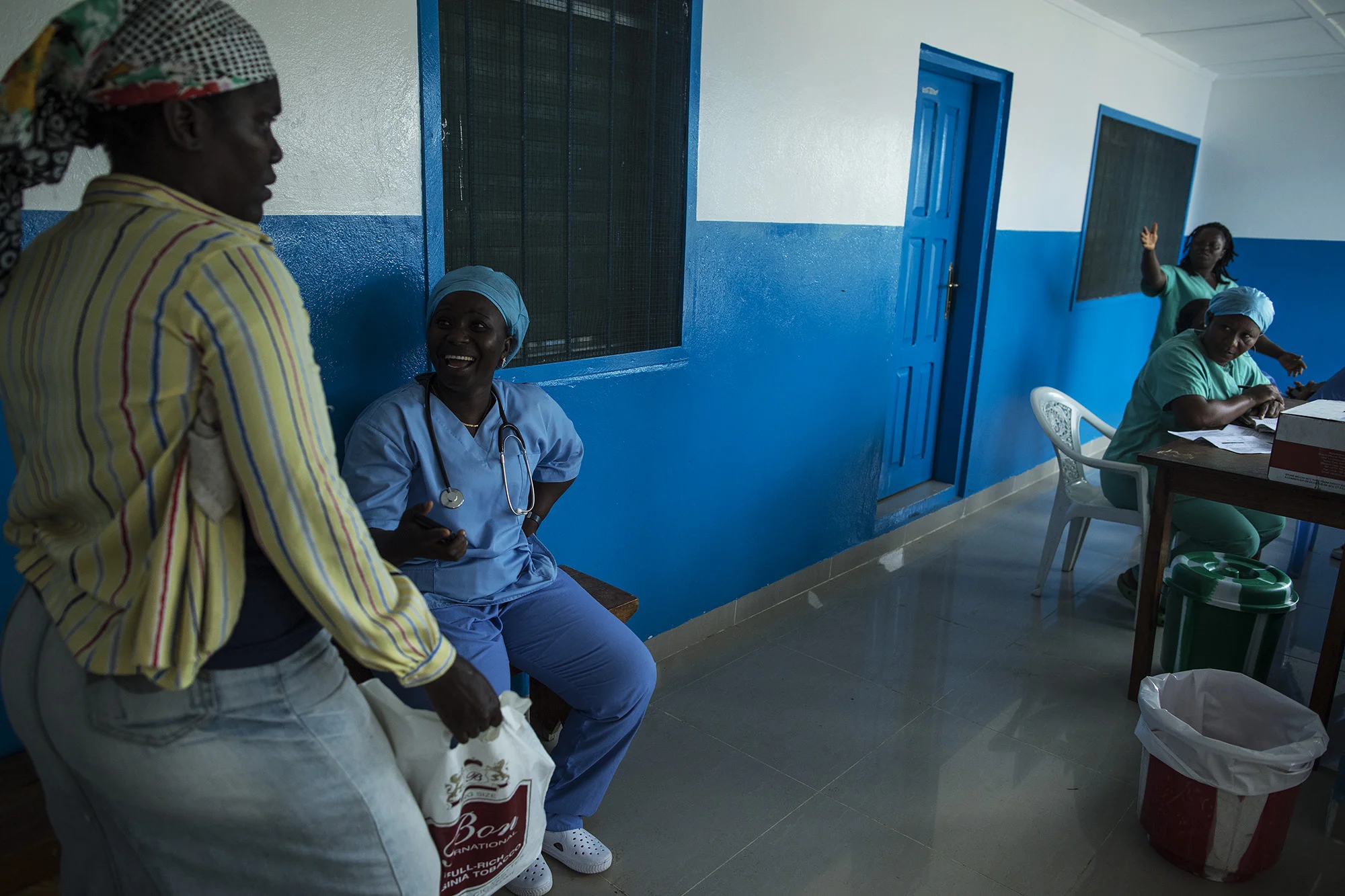 BREWERVILLE, LIBERIA: Aug. 22, 2017 - Wislyne S. Yarh Sieh is a registered nurse and Officer in Charge (OIC) at Kpallah Community Clinic in Brewerville. Wisylne worked as a healthcare worker during the Ebola outbreak in 2014-2015. Healthcare workers like Wislyne were left isolated and alone to fight this mysterious disease from the heart of the jungle. But, she, along with many others, continued to fight. "Being a nurse is like being a soldier. You cannot take your uniform off when there is battle. Then you are not a soldier. So I went on the frontline because I wanted to save lives," she remembers.
The Ministry of Health did not have a centralized system to communicate vital information to healthcare workers across the country at the same time. UNICEF and USAID worked together to create a platform that utilized mobile phones to facilitate a two way communications system between healthcare workers and the centralized ministry.
Because of this new technology, healthcare workers across the country can receive text messages with important information about health emergencies. They are also able to use their phones to inform the Ministry of Health about the status of stocks in the clinic.
Since Ebola, Wislyne has started using the new platform and now feels more connected and informed. She says, "If this program just stopped without things being in place, it would carry our work backward. It would make my work longer and delay treatment of the patients."