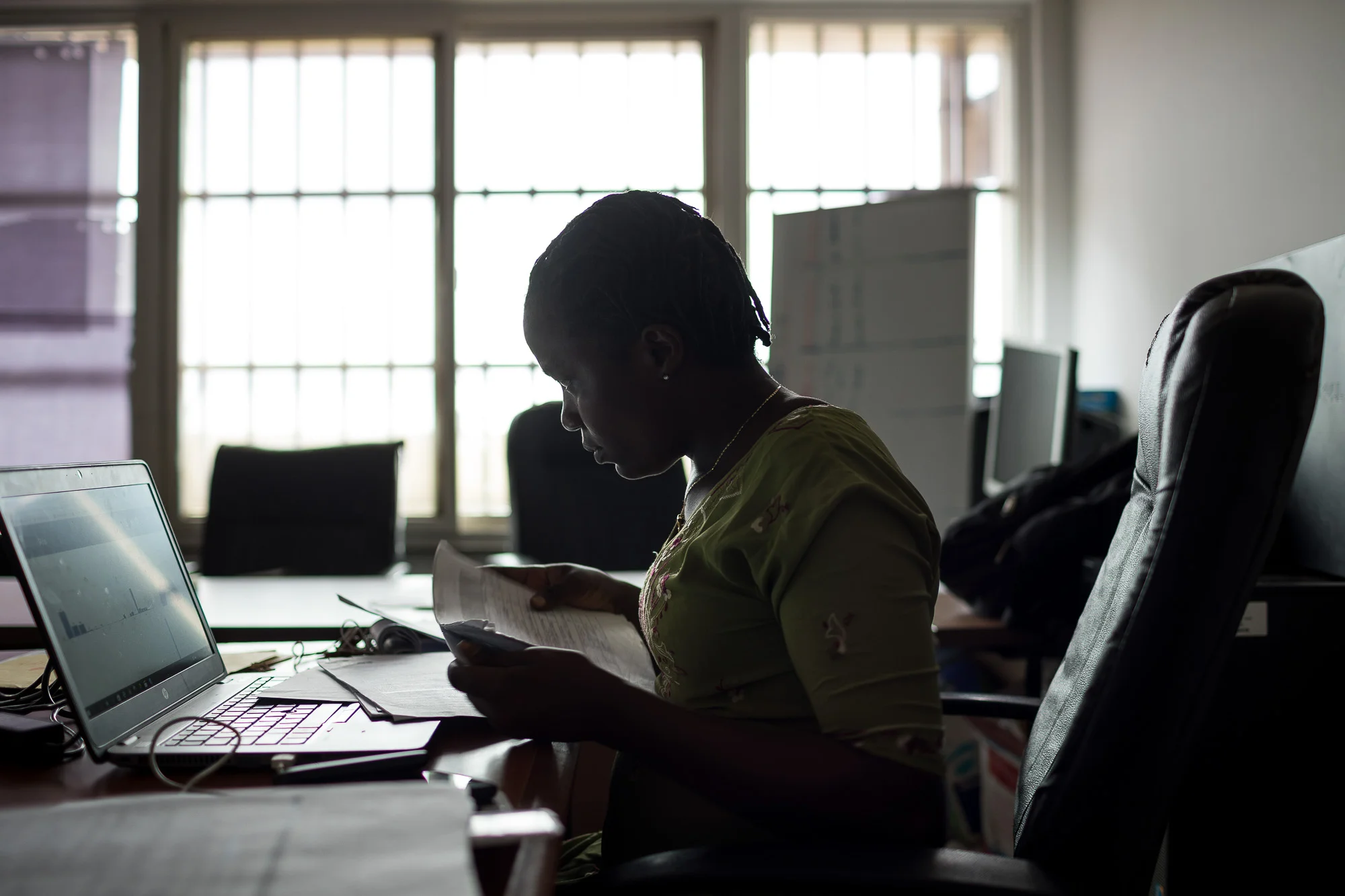 MONROVIA, LIBERIA: August 23, 2017 - During the Ebola outbreak that started in 2014 there was no centralized system for the Ministry of Health to communicate to all healthcare workers across the country at the same time. UNICEF and USAID teamed up to create a platform that utilized mobile phones to facilitate a two way communication system between healthcare workers and the centralized ministry. Now healthcare workers receive text messages on their phones with vital information when there is a health emergency. They can also use their phones to send important information like the status of supply stocks in the clinic. Photo by Morgana Wingard