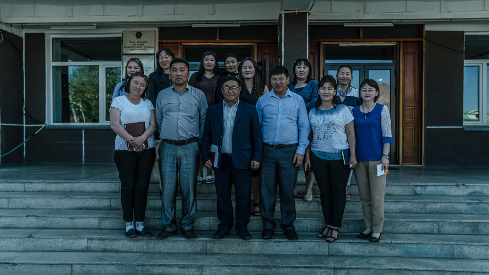  KHOVD, MONGOLIA - JUNE 14, 2018: A meeting of local stakeholders led by Mr. Narandorj (Deputy Head of Education Agency) in Khovd. Together, they worked with the local community  to improve the school services provided by the government to 10 schools