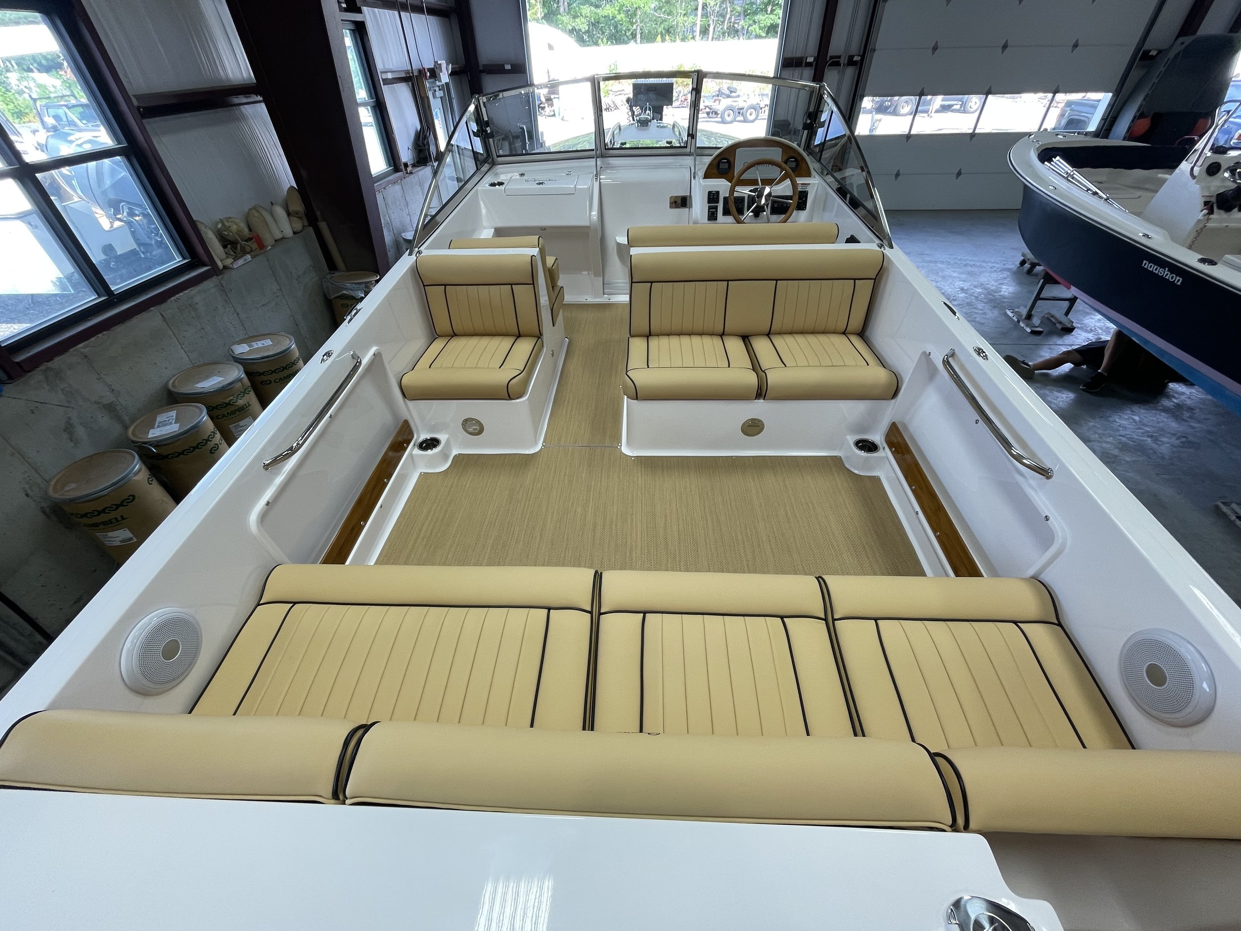 23-rossiter-picnic-boat-upholstered-seating-seagrass-mat.jpeg