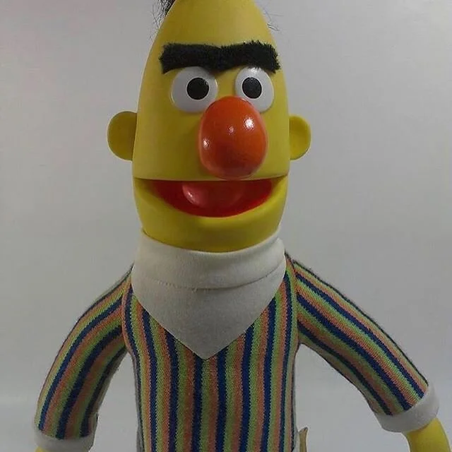 The toy version of #bert and #ernie that I sculpted and a photo of #jimhenson holding him. #sesamestreet #muppets #puppets #jimhenson #jimhensoncreatureshop