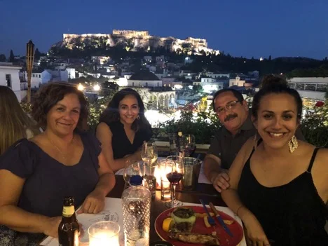 My family and I having dinner during our last night in Greece.
