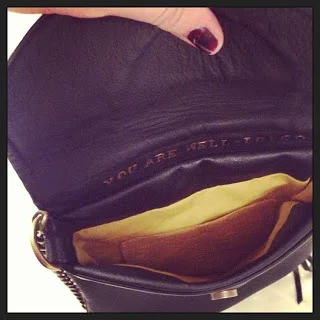 Savannah,GA: Mustard yellow lining, with a mustard yellow pocket that will hold her iphone. 