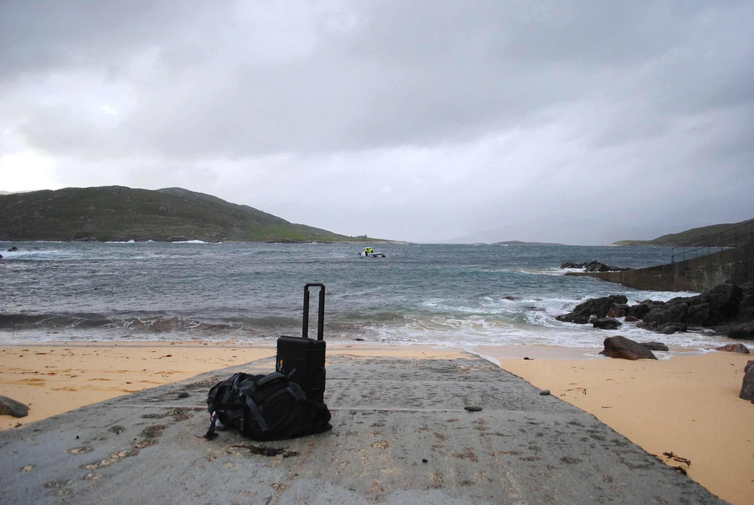 Waiting for a boat ride to complete the last leg of travels to reach the work location.