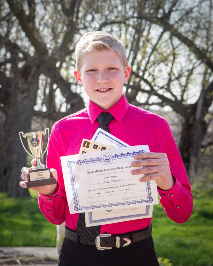 Silas with this school year's piano awards!