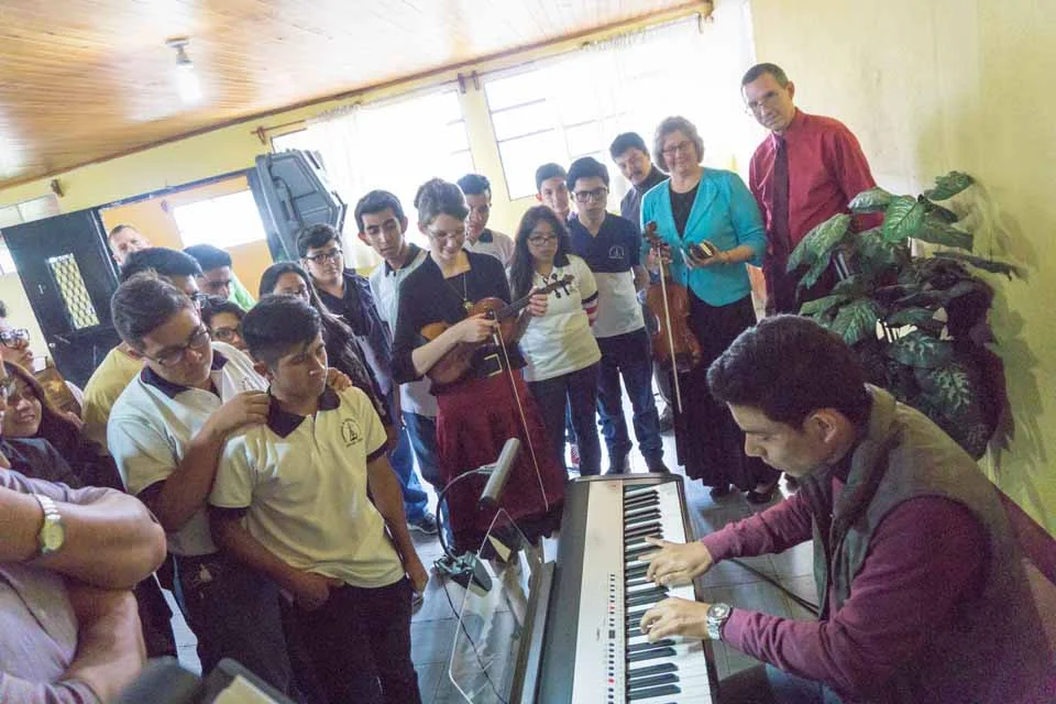 Abigail giving a masterclass at a music conservatory.