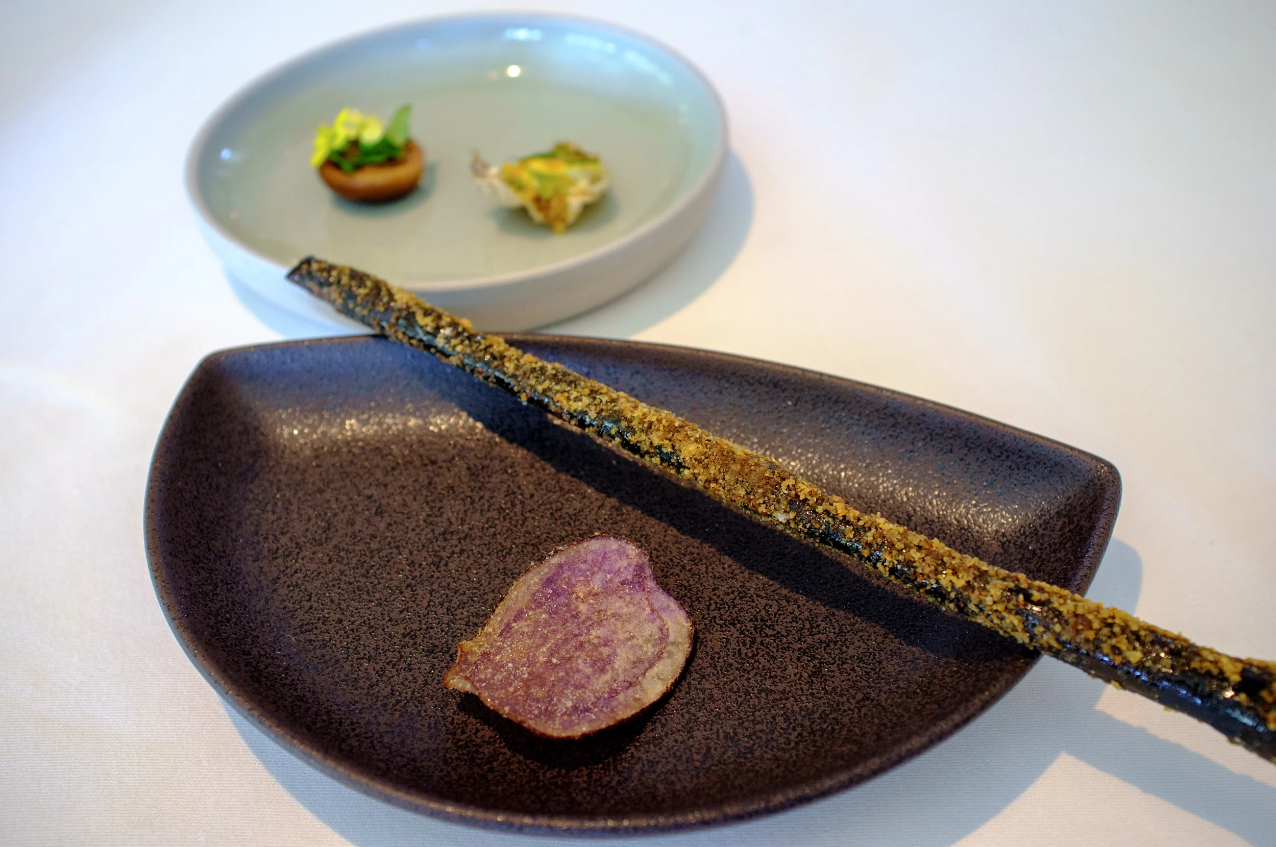 Salt and vinegar potato, burnt pretzel with treacle and pork