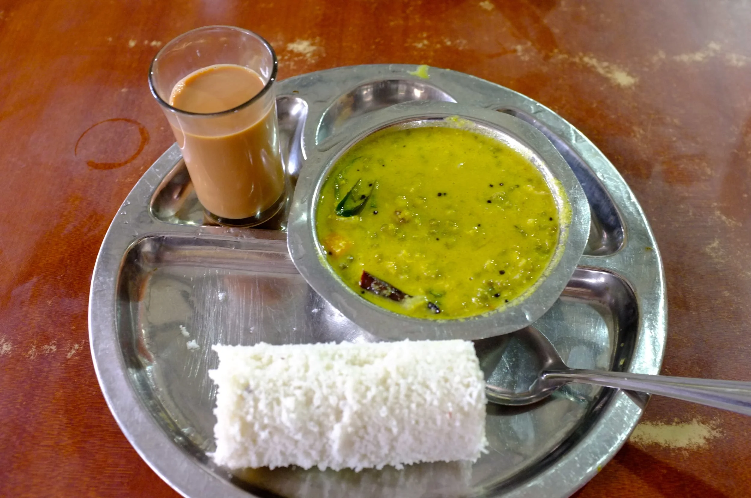 Puttu and chai for breakfast at Arya Bhavan in Kozhikode, Kerala